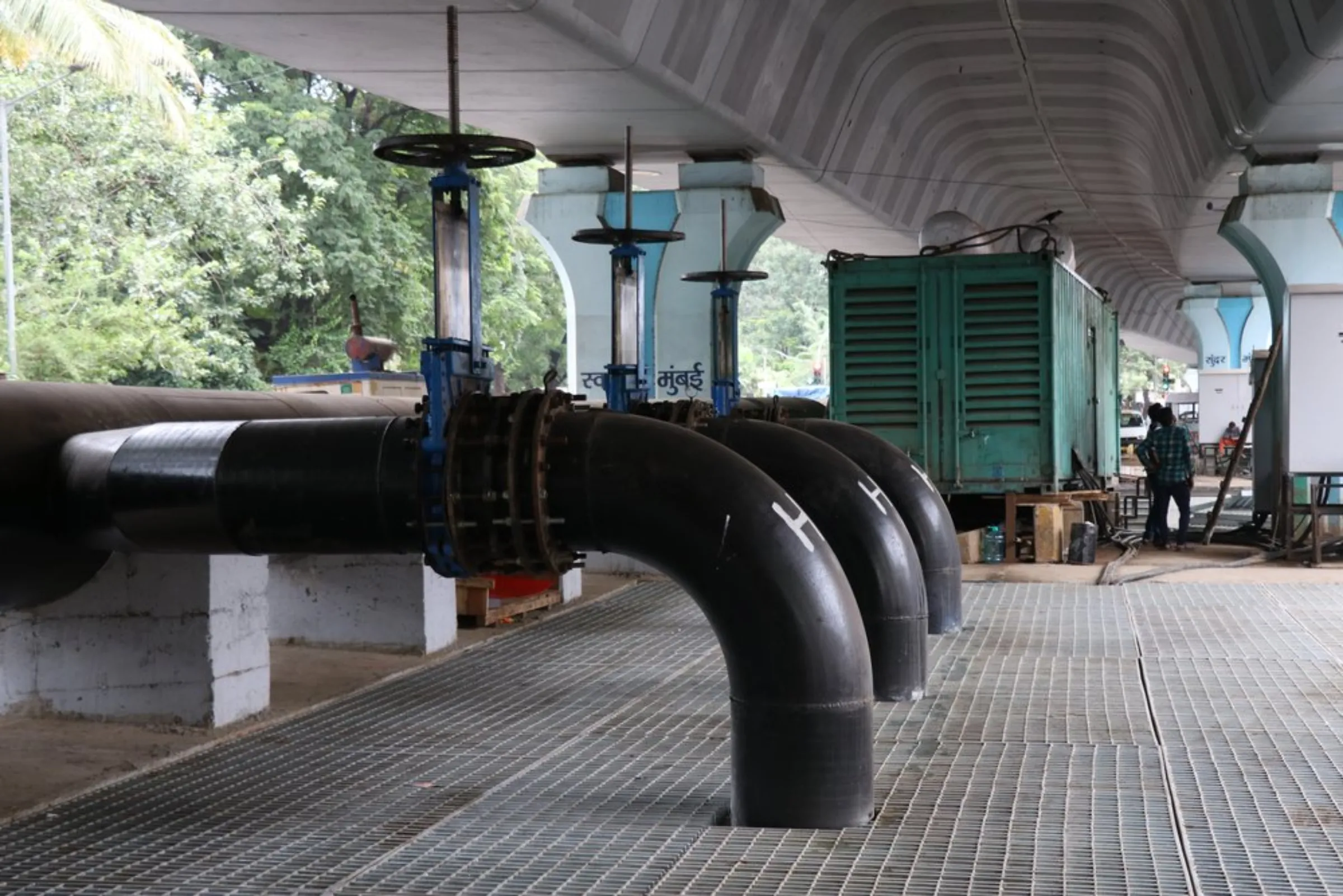 Newly installed underground water pumps, designed to carry away excess water and prevent flooding, sit under a road flyover at Hindmata in Mumbai, India, September 7, 2021