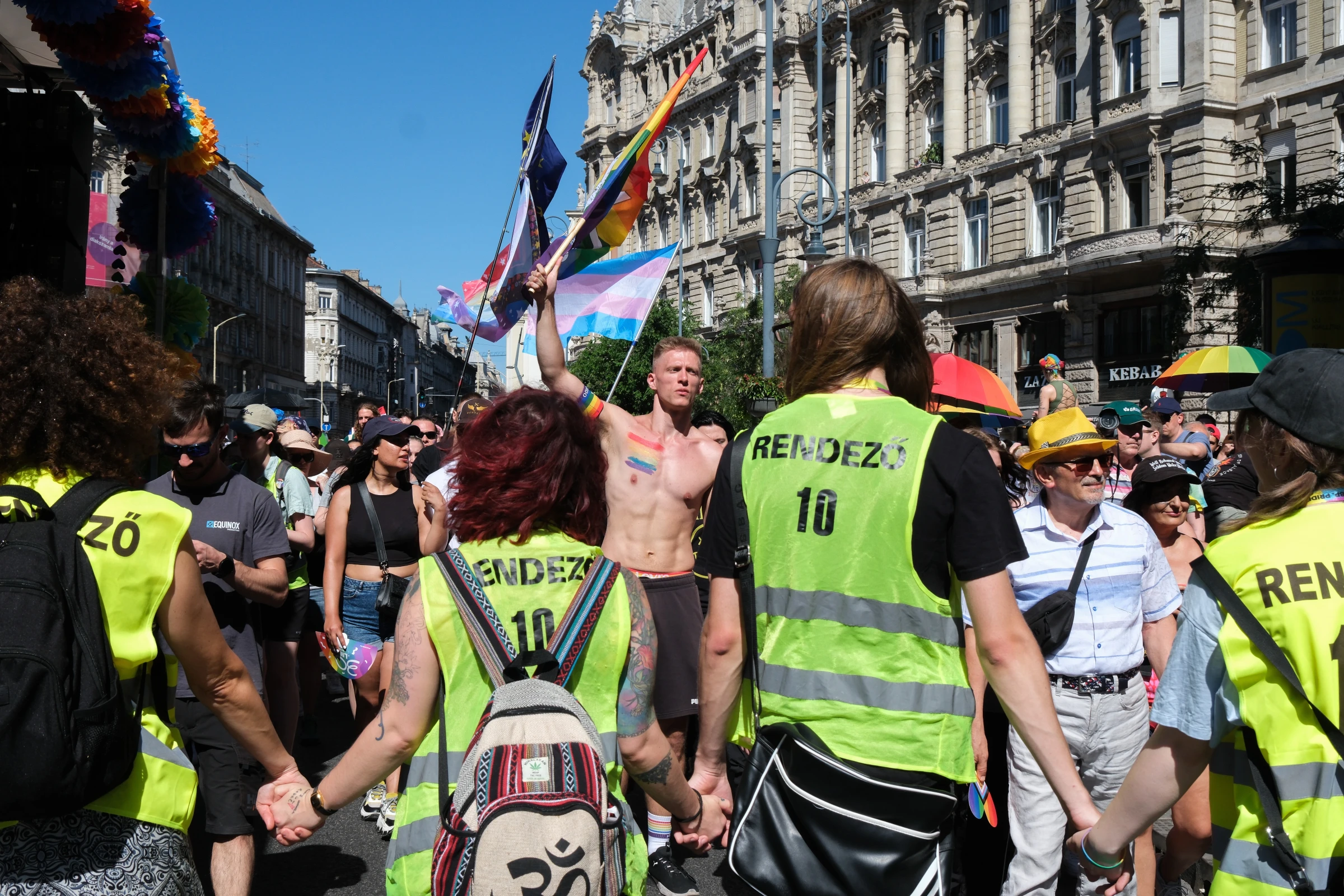 Person carries a rainbow flag at the front of the parade. Budapest, Hungary, June 28, 2025. Thomson Reuters Foundation/Mirja Vogel