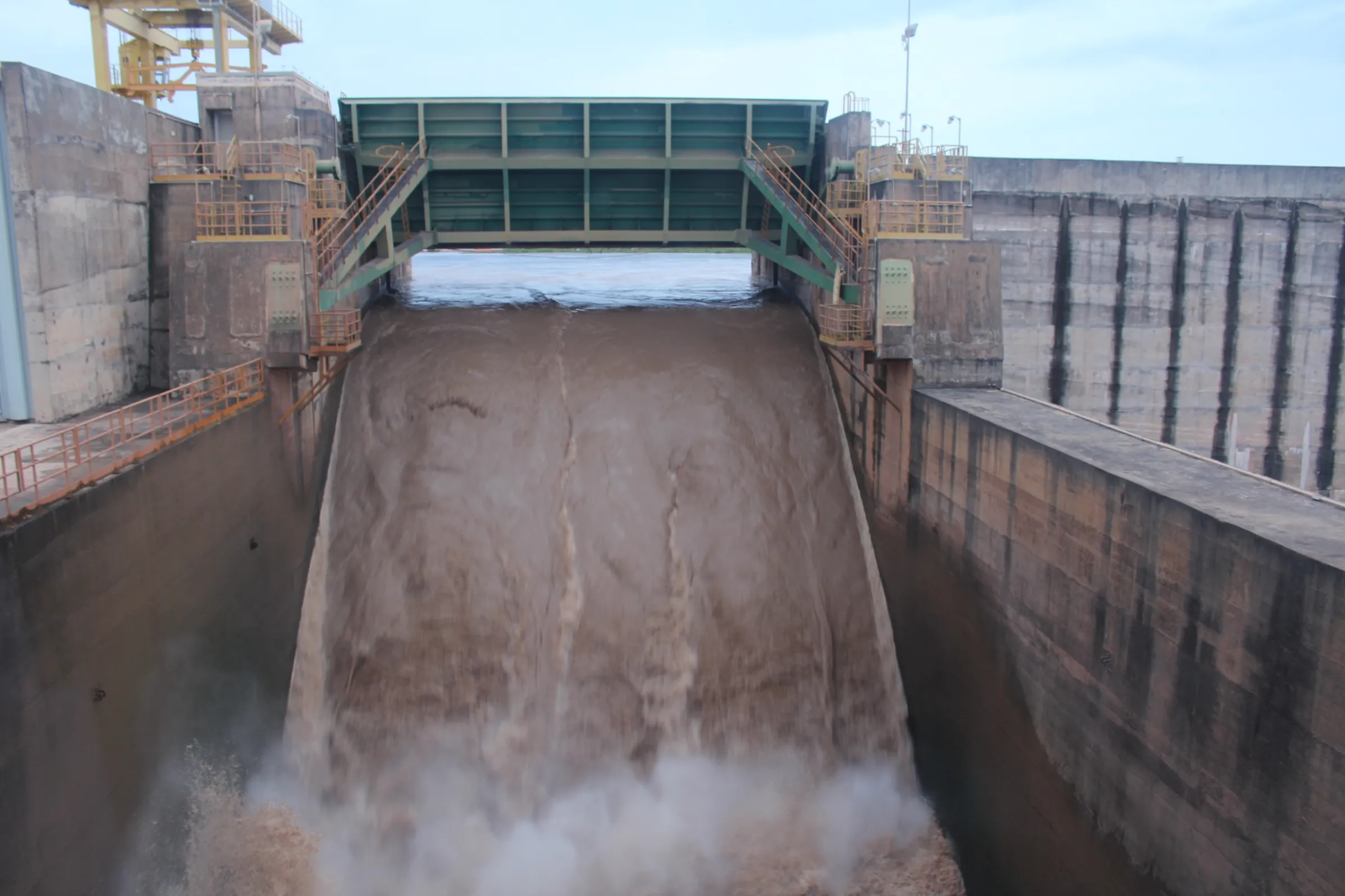 A dam gate from the Santo Antônio dam used to control the level of the Madeira river in Porto Velho, Brazil’s Amazon, Feb. 24, 2024. Thomson Reuters Foundation/André Cabette Fábio