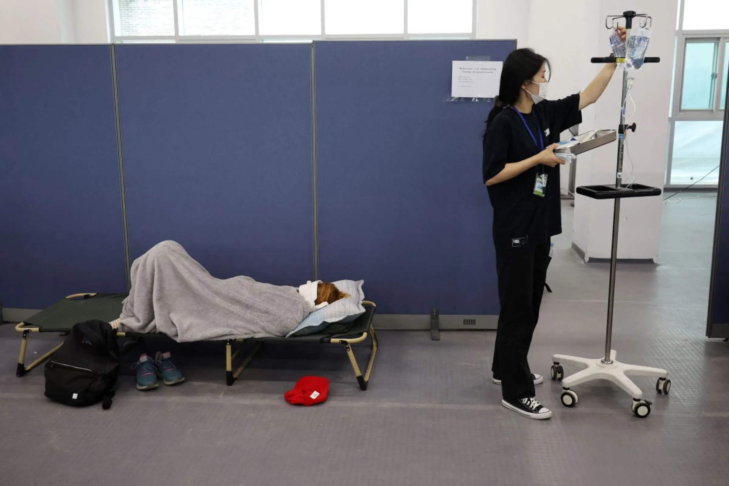 A participant receives medical treatment at Jamboree Hospital during the 25th World Scout Jamboree in Buan, South Korea