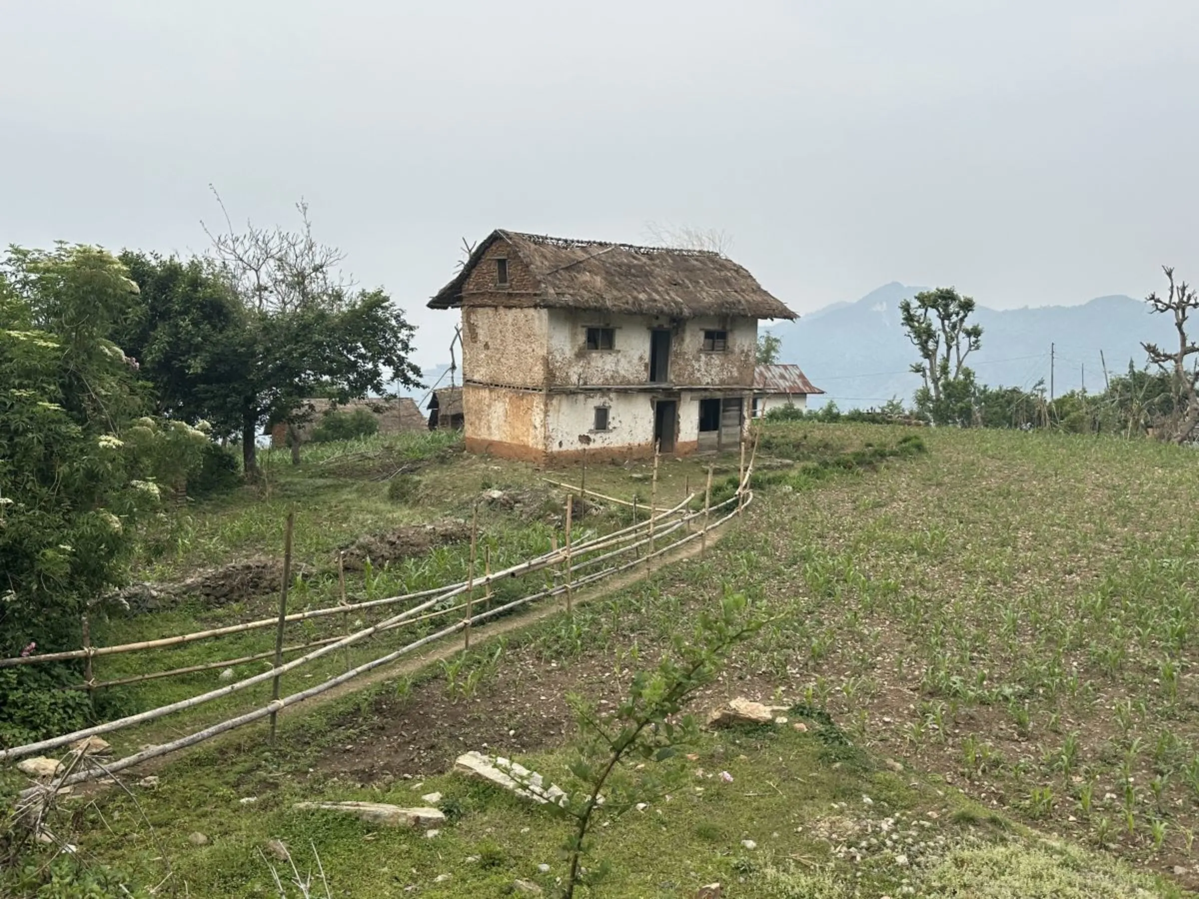 An abandoned house in Puranogaun village where Sarita Rai lives in Khotang, Nepal, April 30, 2023
