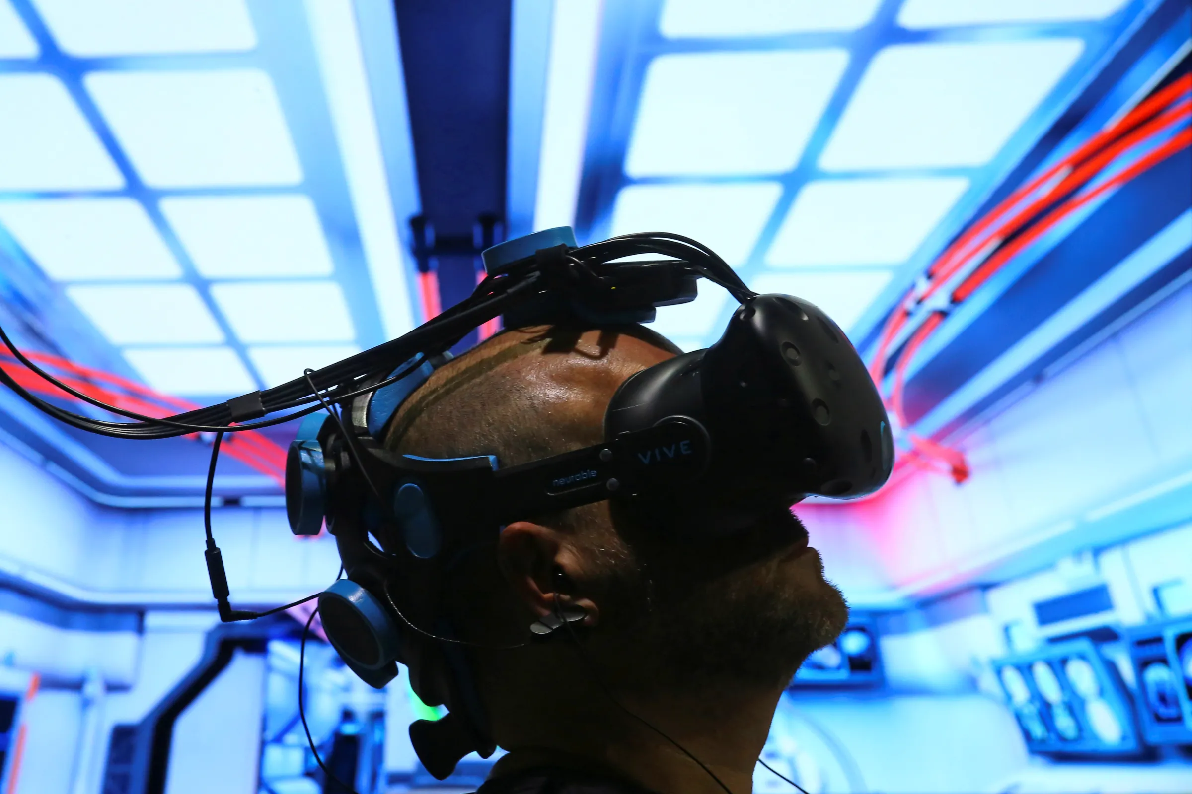 A man tests a virtual reality system made by Neurable that allows the user to control their VR environment with their thoughts, in Los Angeles, California, U.S. July 31, 2017. REUTERS/Mike Blake