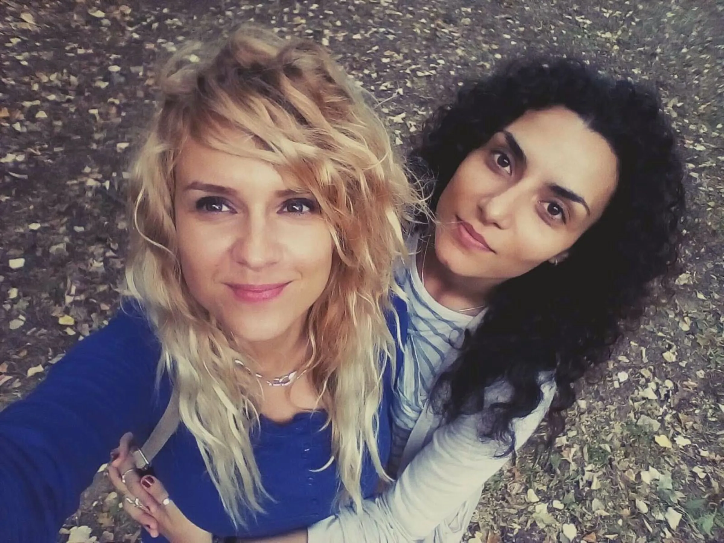 Radica Stevanov (L) and Stefana Budimirovic (R) pose for a photo together in the woods of Fruska Gora, Serbia in this undated handout photo. Stefana Budimirovic/Handout via Thomson Reuters Foundation