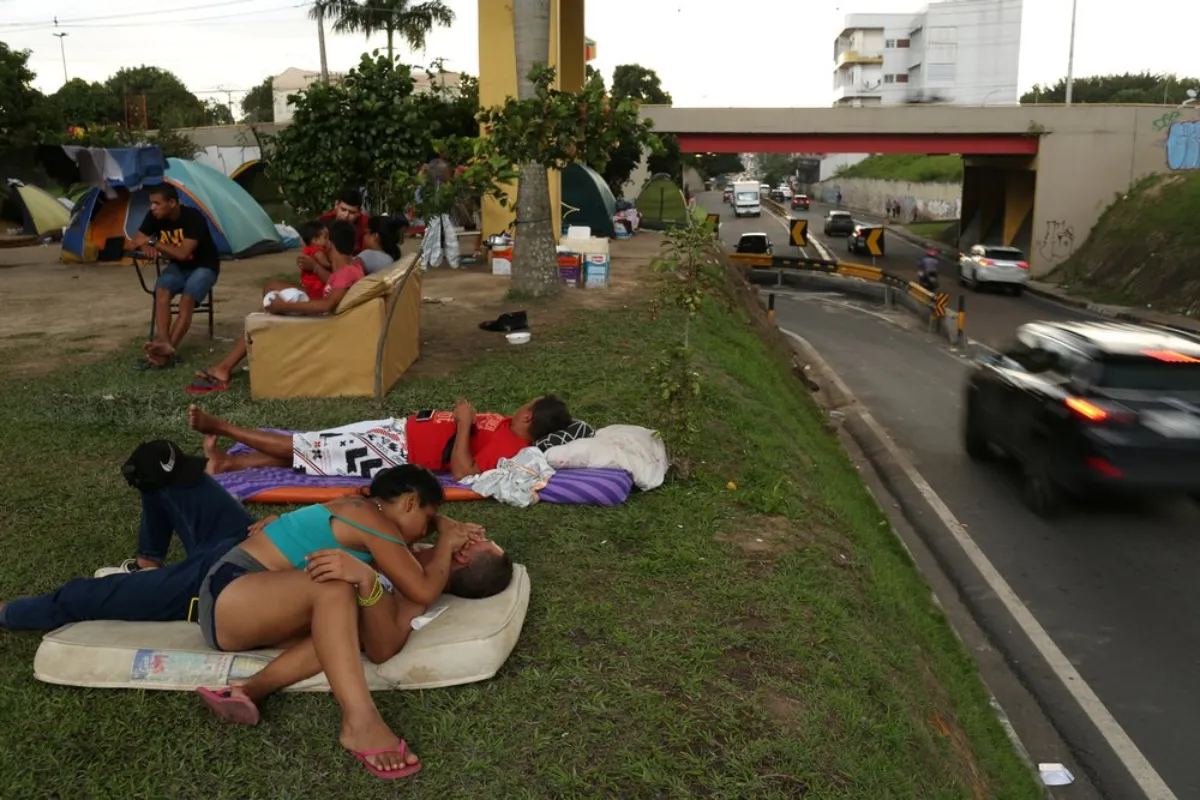 Venezuelan people are seen near a bus terminal in Manaus, Brazil January 14, 2019