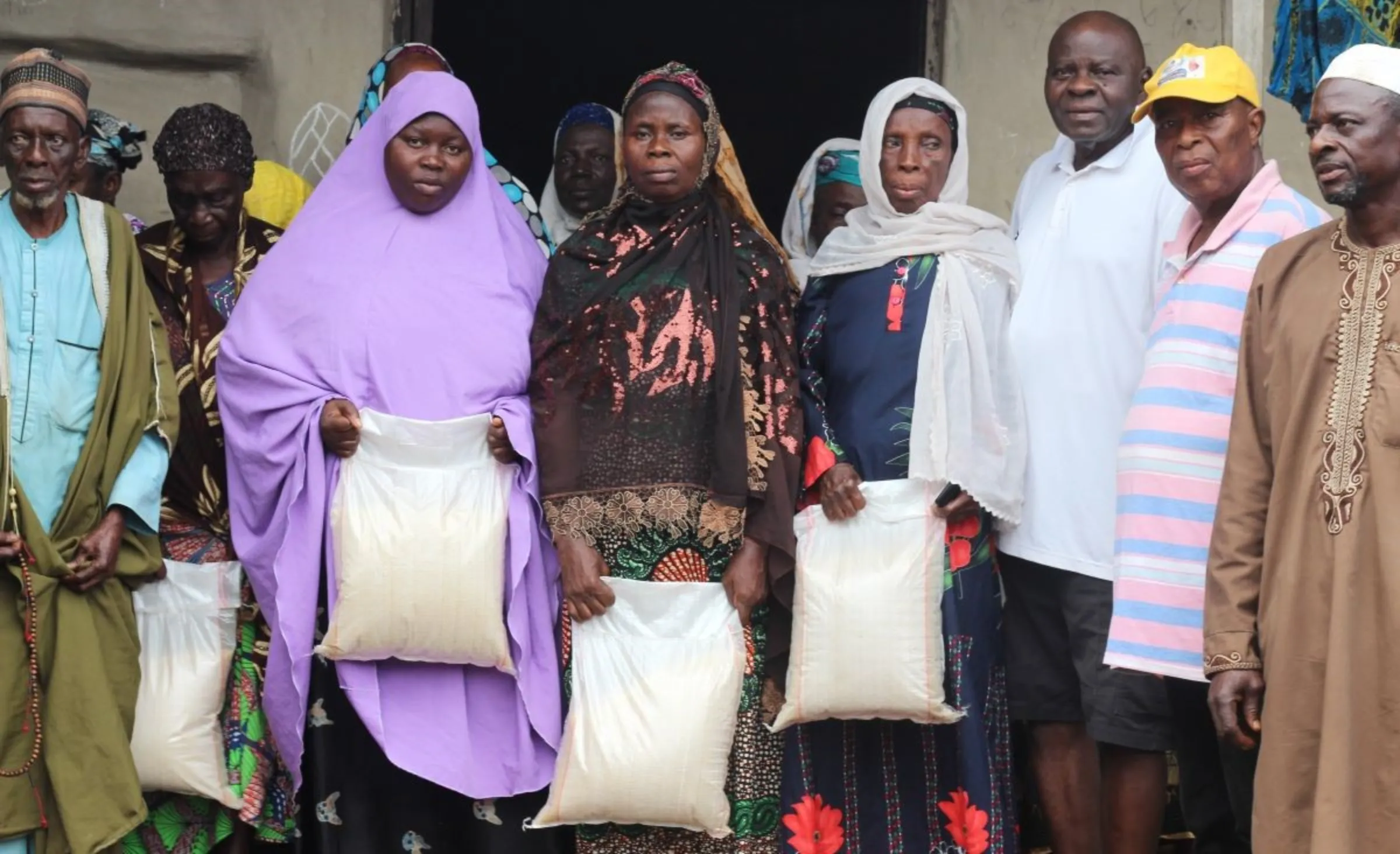 Beneficiaries of the September food relief items distributed by the Kwara government in Ilorin, Nigeria on Sept 30, 2023. Bukola Adebayo/Thomson Reuters Foundation.