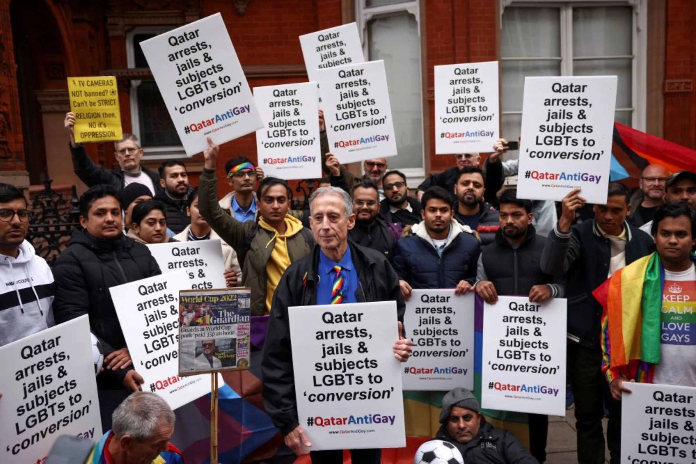 Gay rights campaigner Peter Tatchell stands among people as they demonstrate ahead of World Cup outside the Qatar embassy in London, Britain November 19, 2022. REUTERS/Henry Nicholls