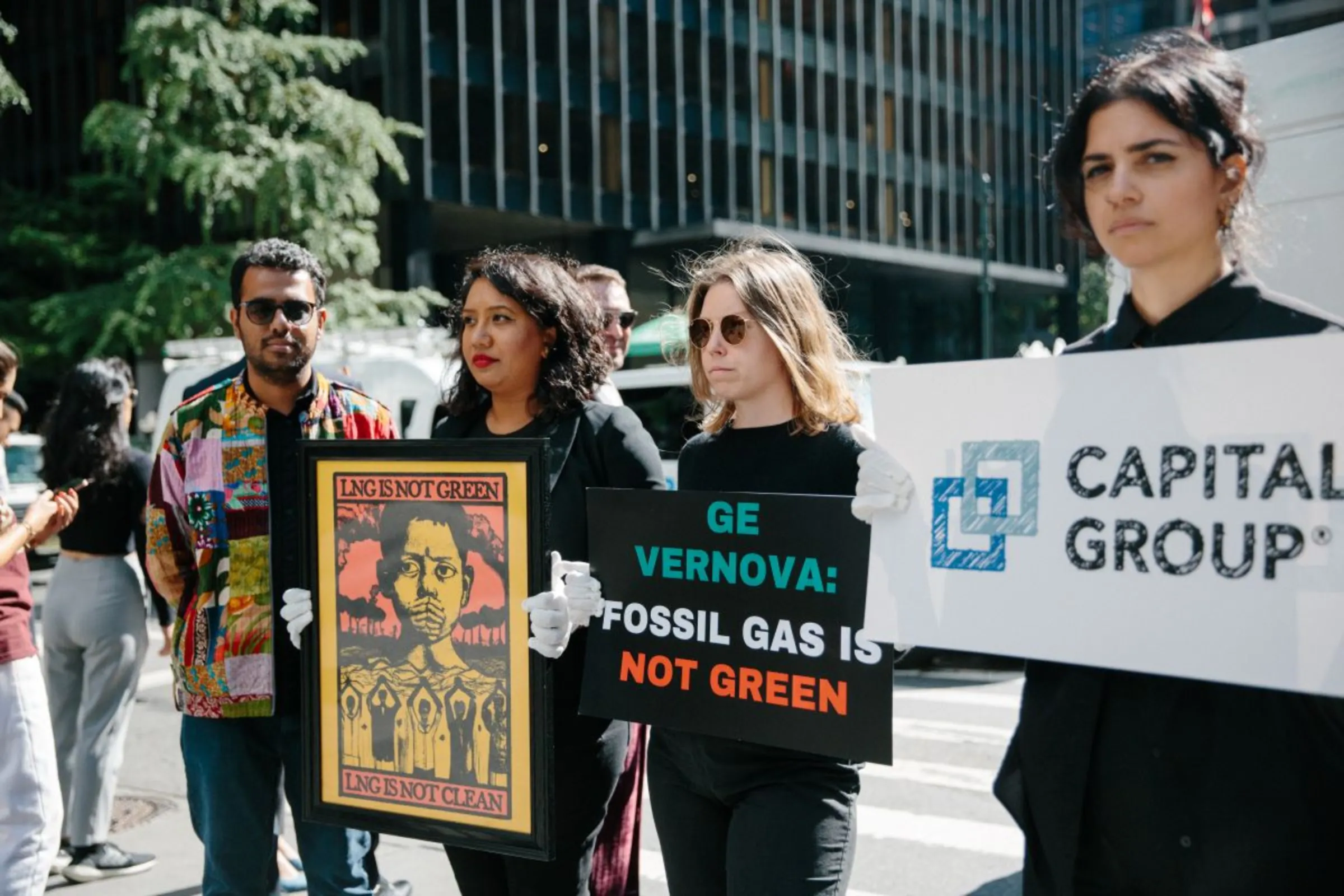 Artist Ata Mojlish and activists protest against LNG projects in Bangladesh before the office of T. Row Price at New York, September 19, 2023. Sawyer Roque for Market Forces/Handout via Thomson Reuters Foundation