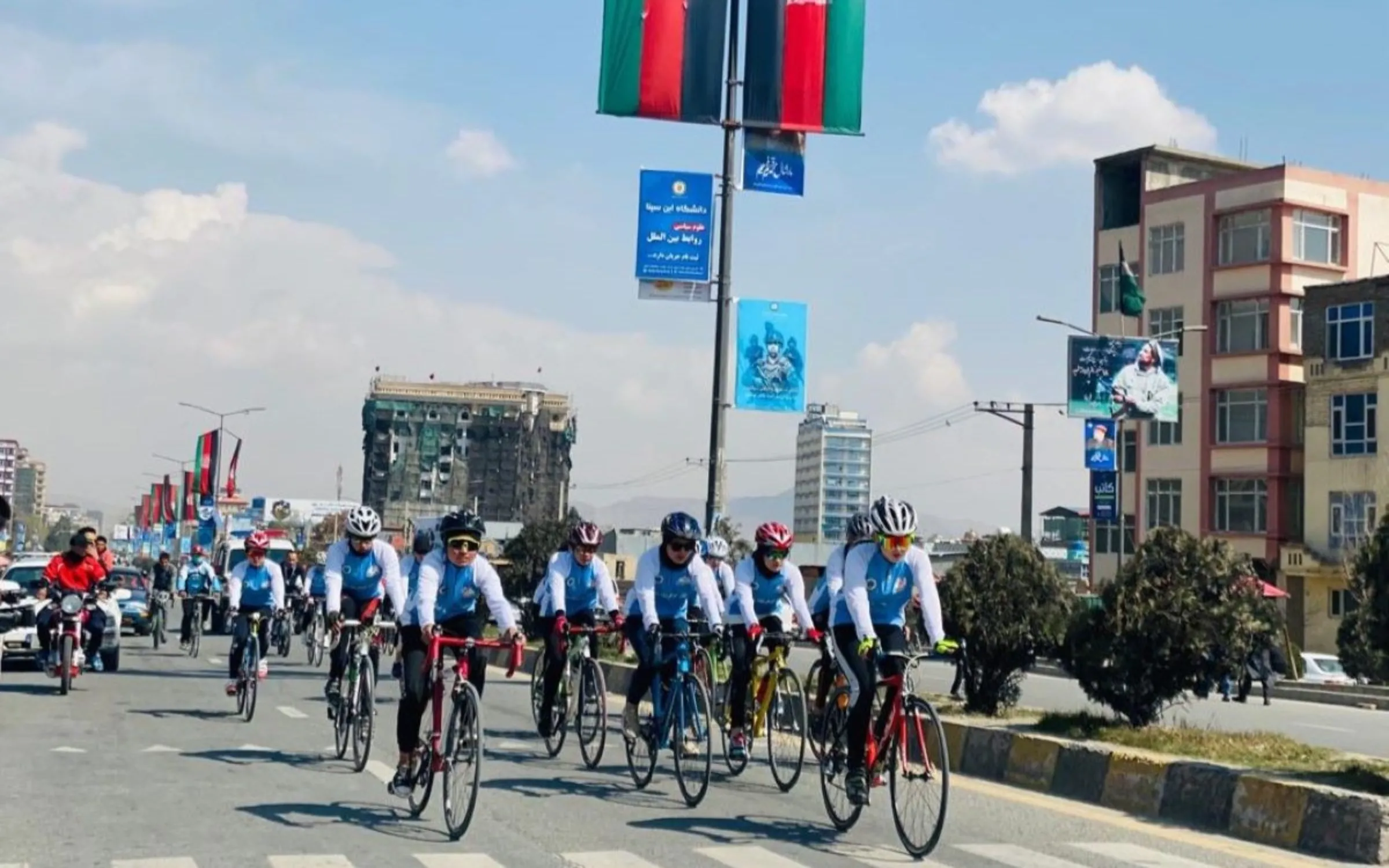 Afghan women cyclists take part in a race to mark International Women's Day, five months before the Taliban takeover, in Kabul, Afghanistan on March 8, 2021. Alessandra Cappellotto/Handout via Thomson Reuters Foundation