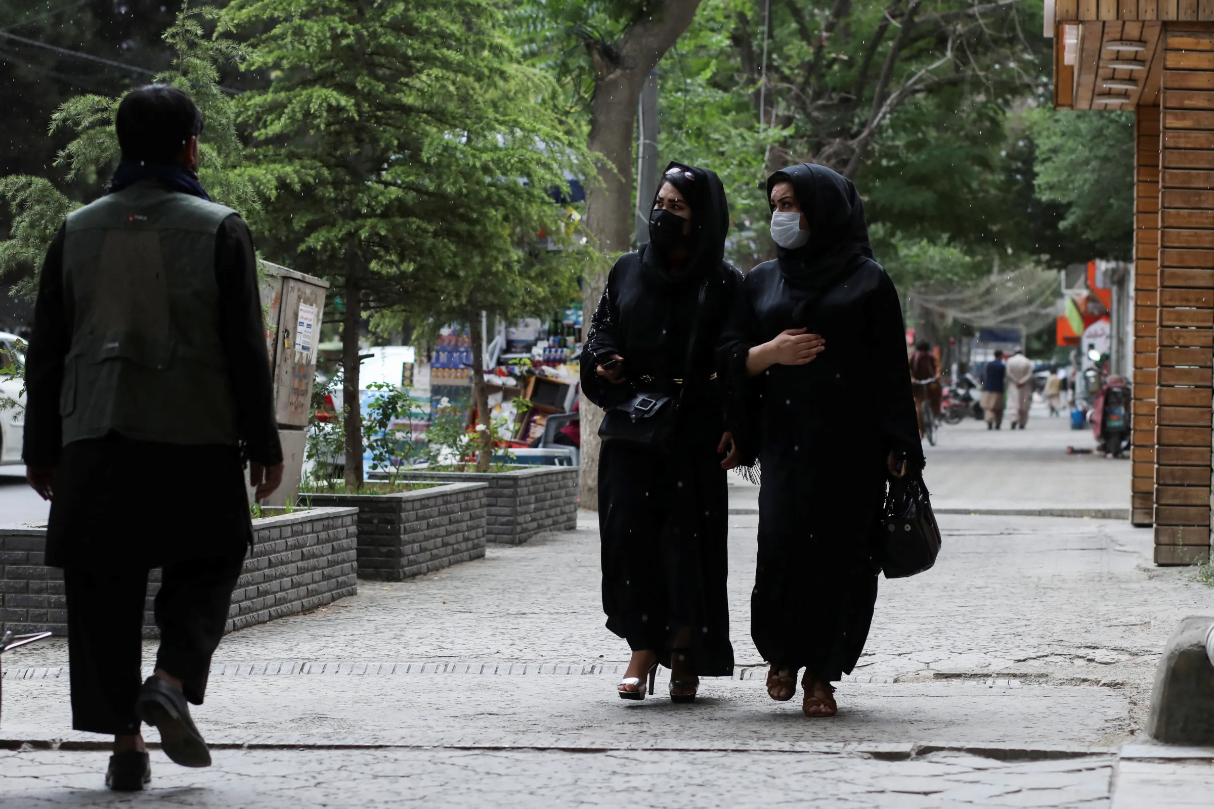 Afghan women walk on a street in Kabul, Afghanistan, May 9, 2022. REUTERS/Ali Khara