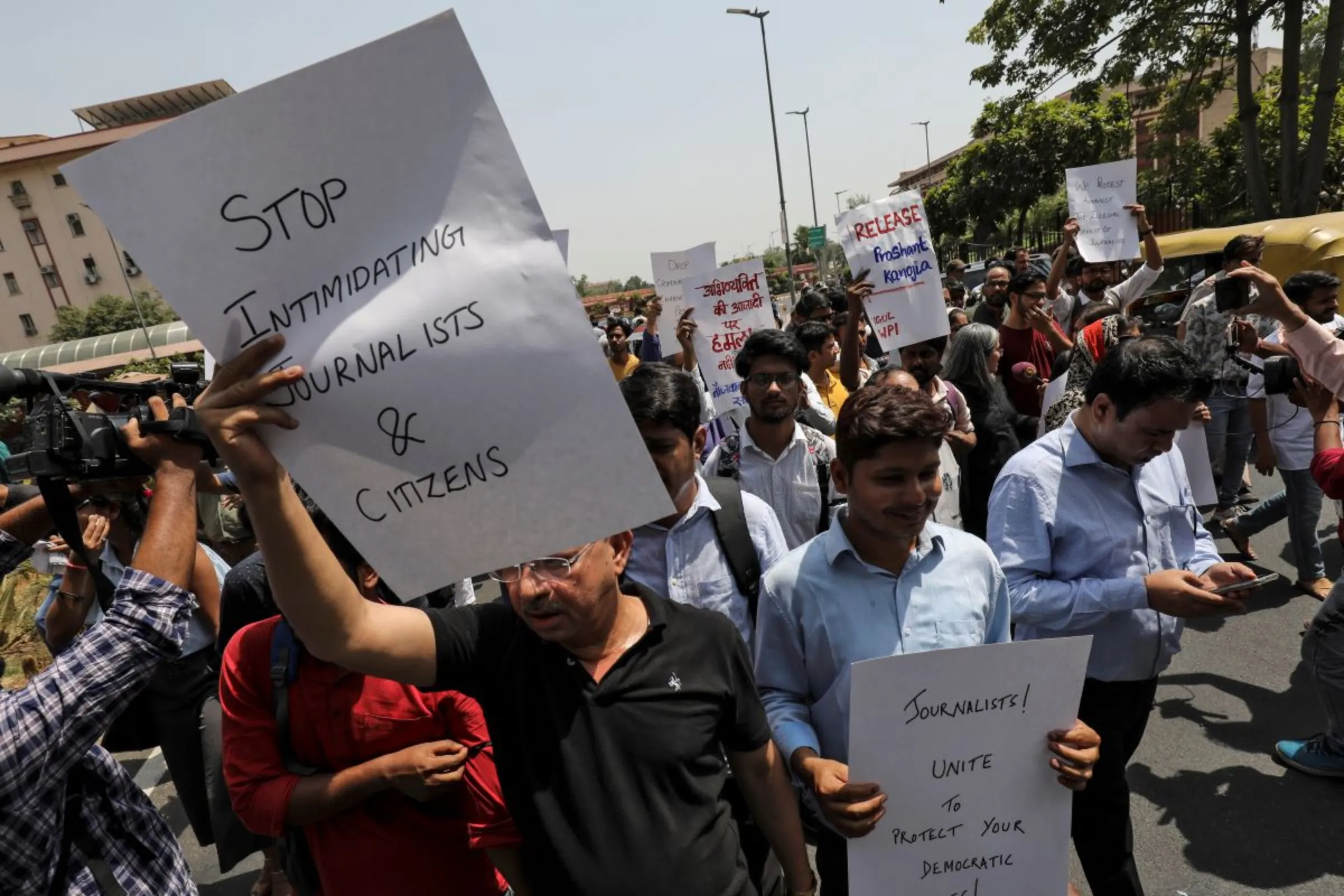 Media members protest against the arrest of journalists for allegedly posting defamatory content on social media against Uttar Pradesh's Chief Minister Yogi Adityanath, in New Delhi, India June 10, 2019