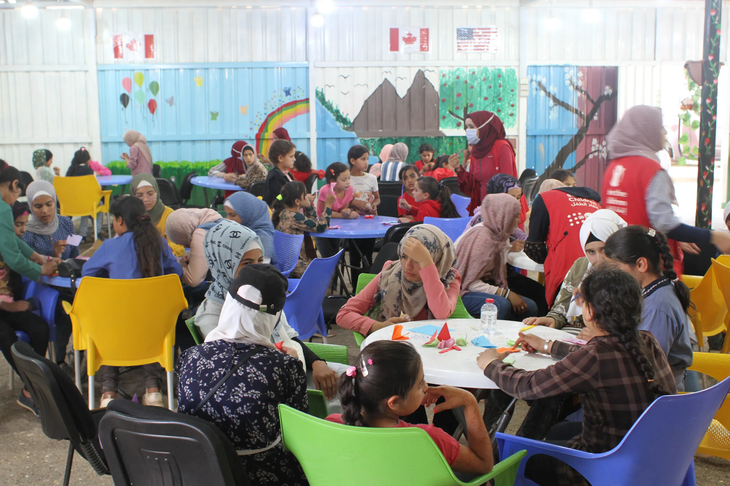 Syrian girls attend classes inside a youth centre at the Zaatari refugee camp near the border city of Mafraq, Jordan, 18 October 2022