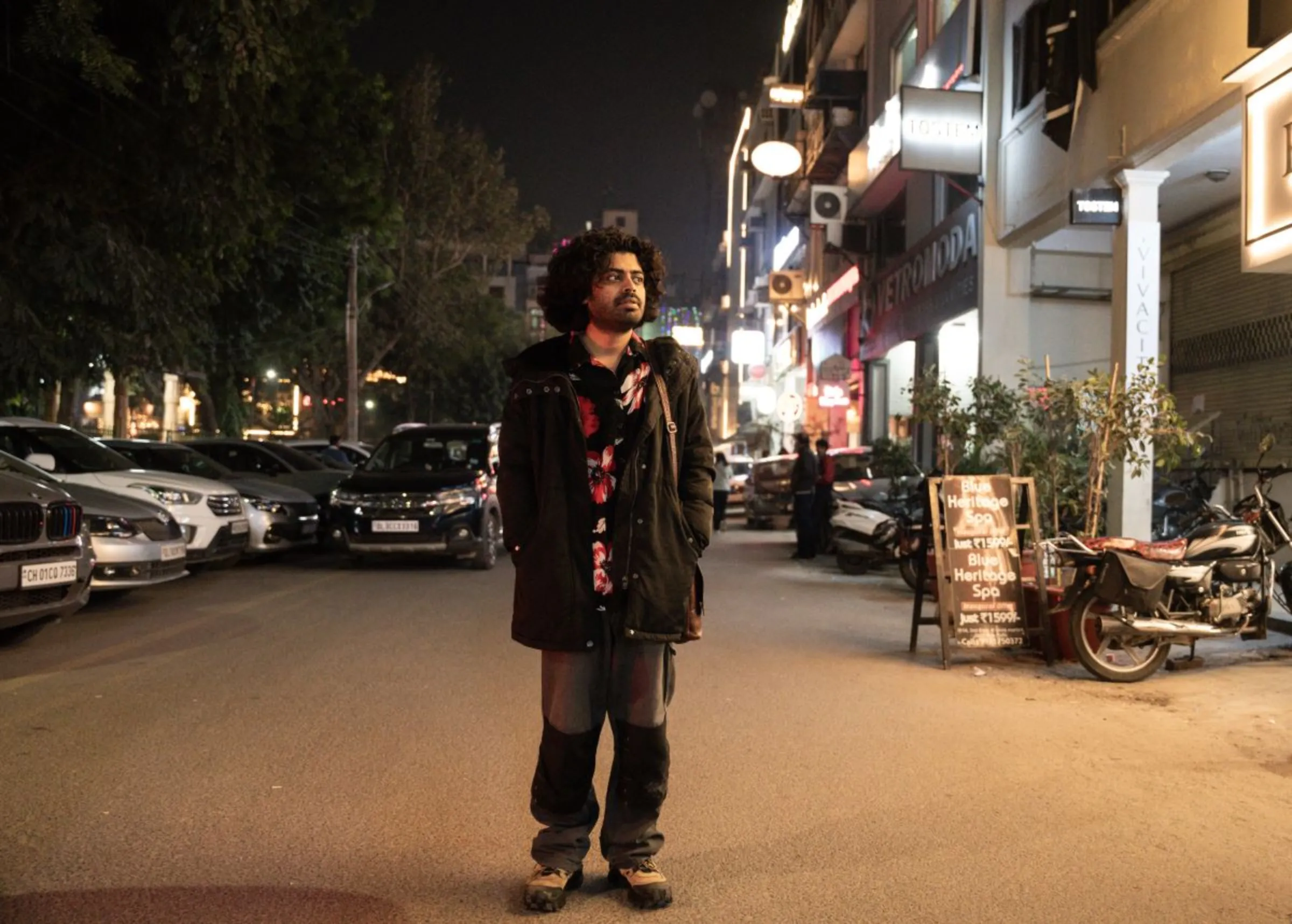 Raqeeb, an LGBTQ+ photographer, poses for a photo in New Delhi, India, December 18, 2023. Thomson Reuters Foundation/Mehran Firdous