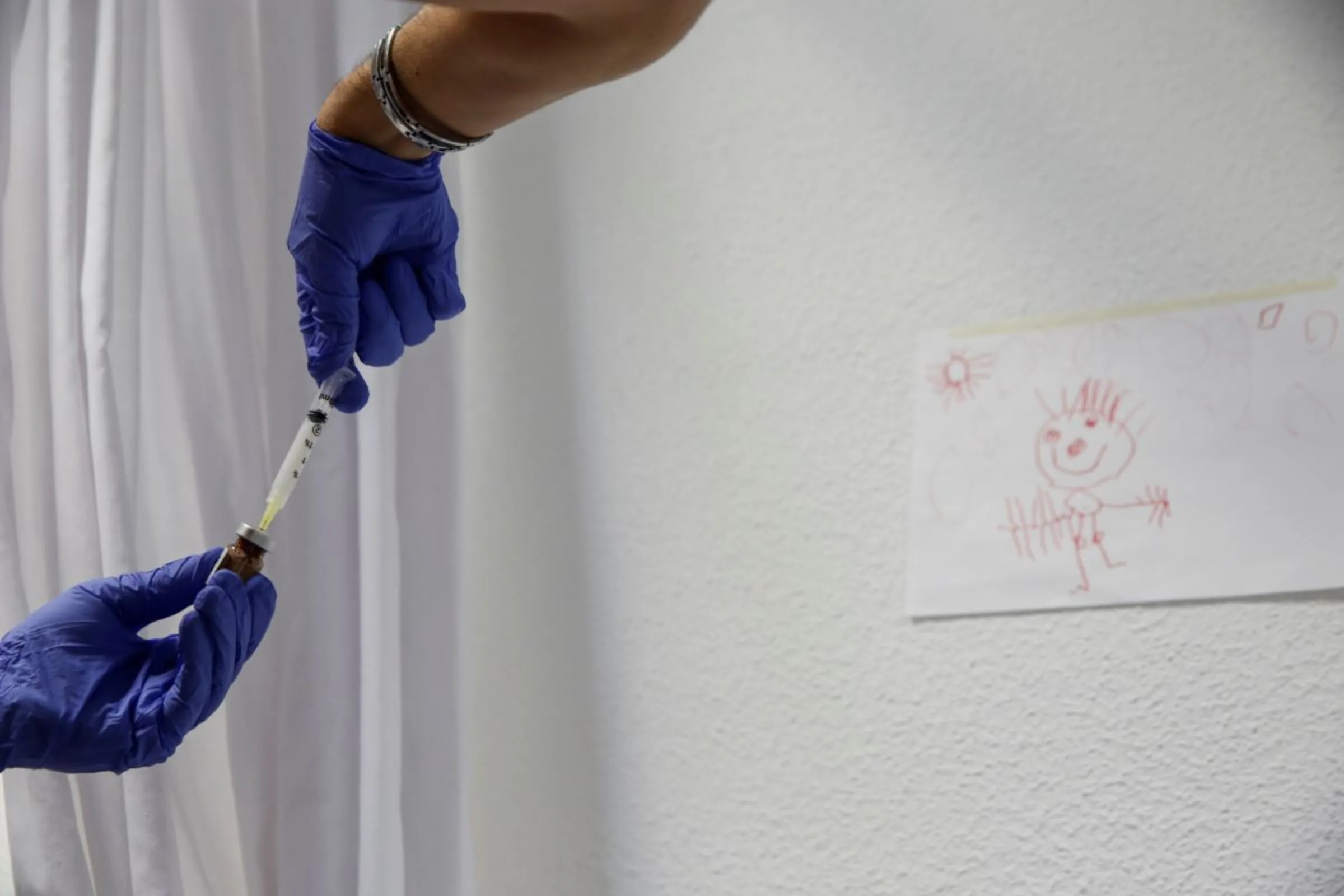 A nurse prepares a hormone blocker for transgender teenager in Madrid, Spain, December 16, 2015. REUTERS/Susana Vera