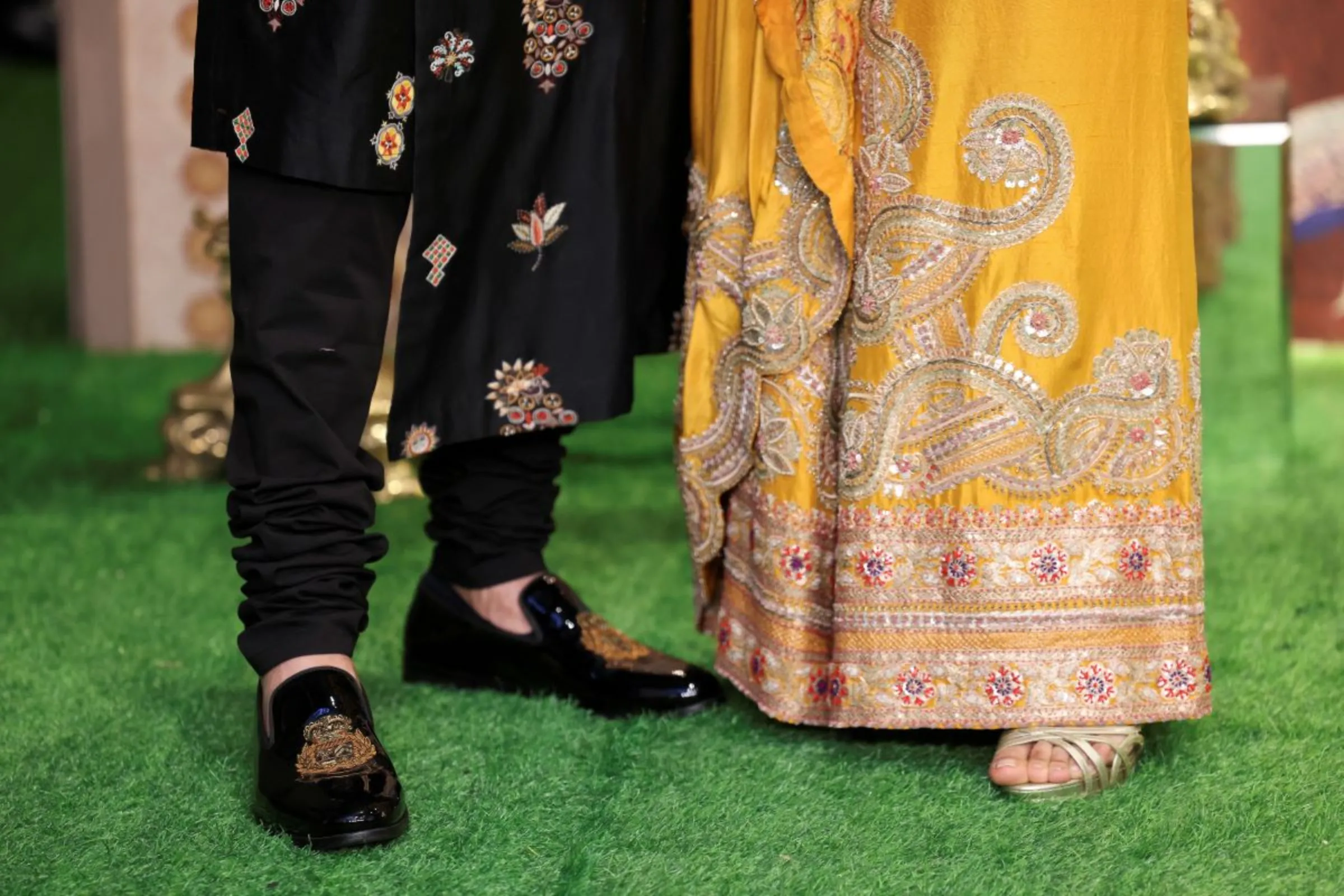 Bollywood actors pose for pictures on the red carpet in Mumbai, India, July 13, 2024. REUTERS/Francis Mascarenhas