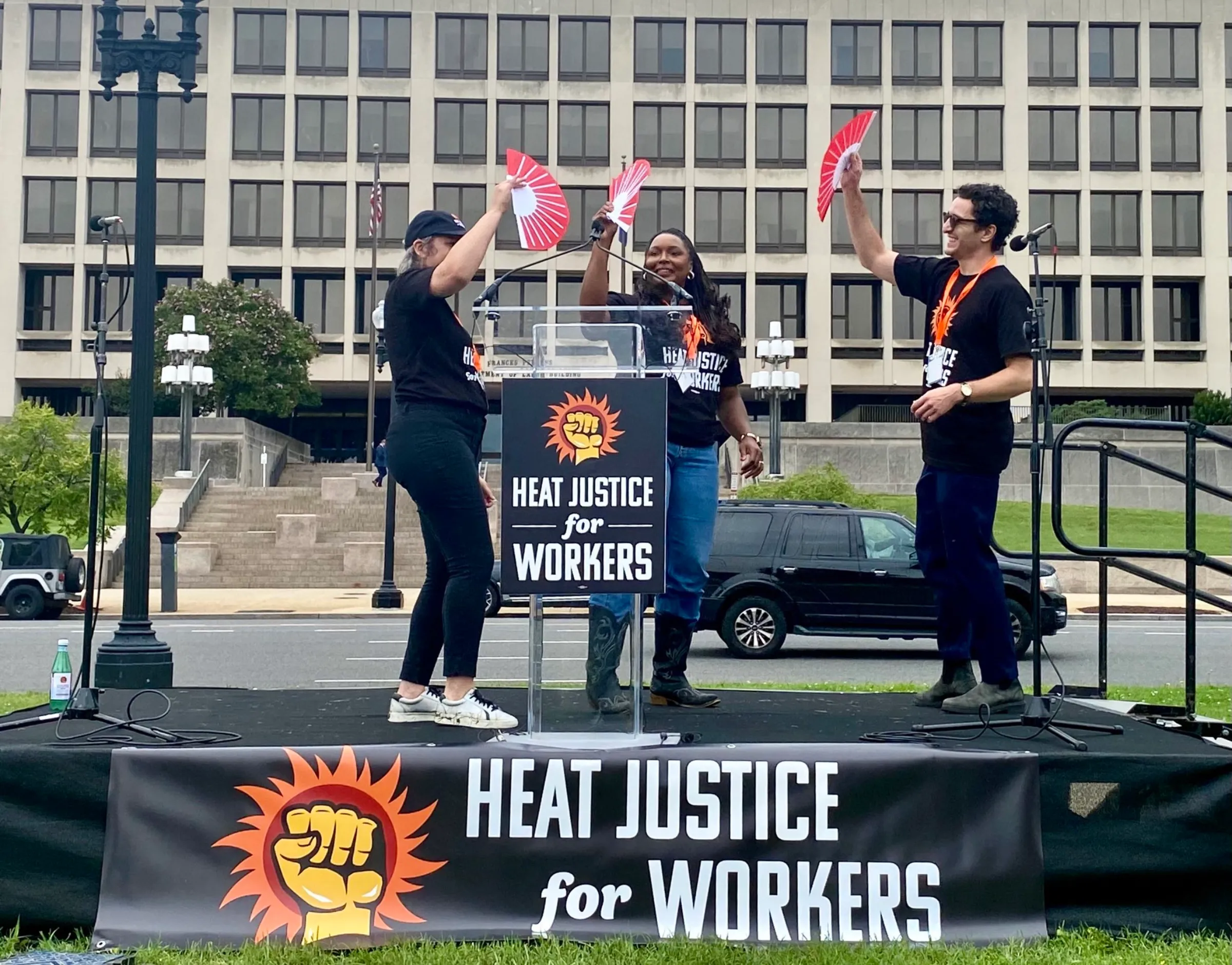 Workers and advocates take part in a Washington event on June 23 in favor of a national workplace heat standard. Fired Up For Heat Justice | National COSH/Handout via Thomson Reuters Foundation