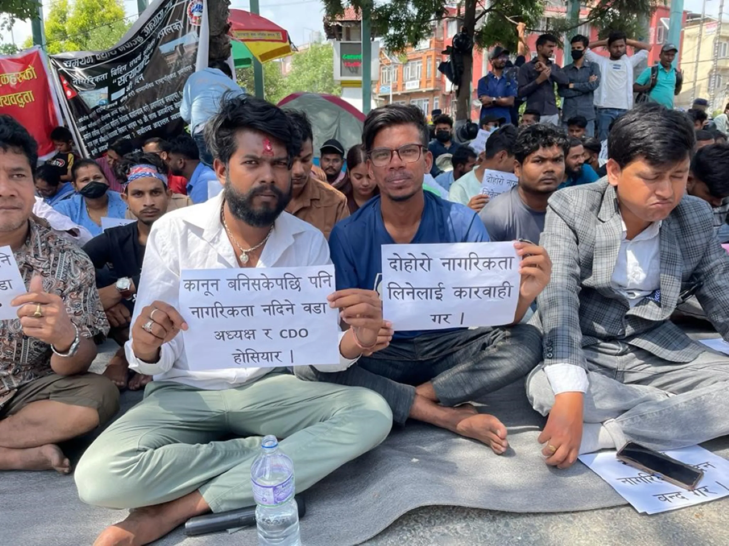 Indrajit Saphi (left) and other activists protest over delays in providing citizenship certificates, June 2023. Indrajit Saphi/Handout via Thomson Reuters Foundation