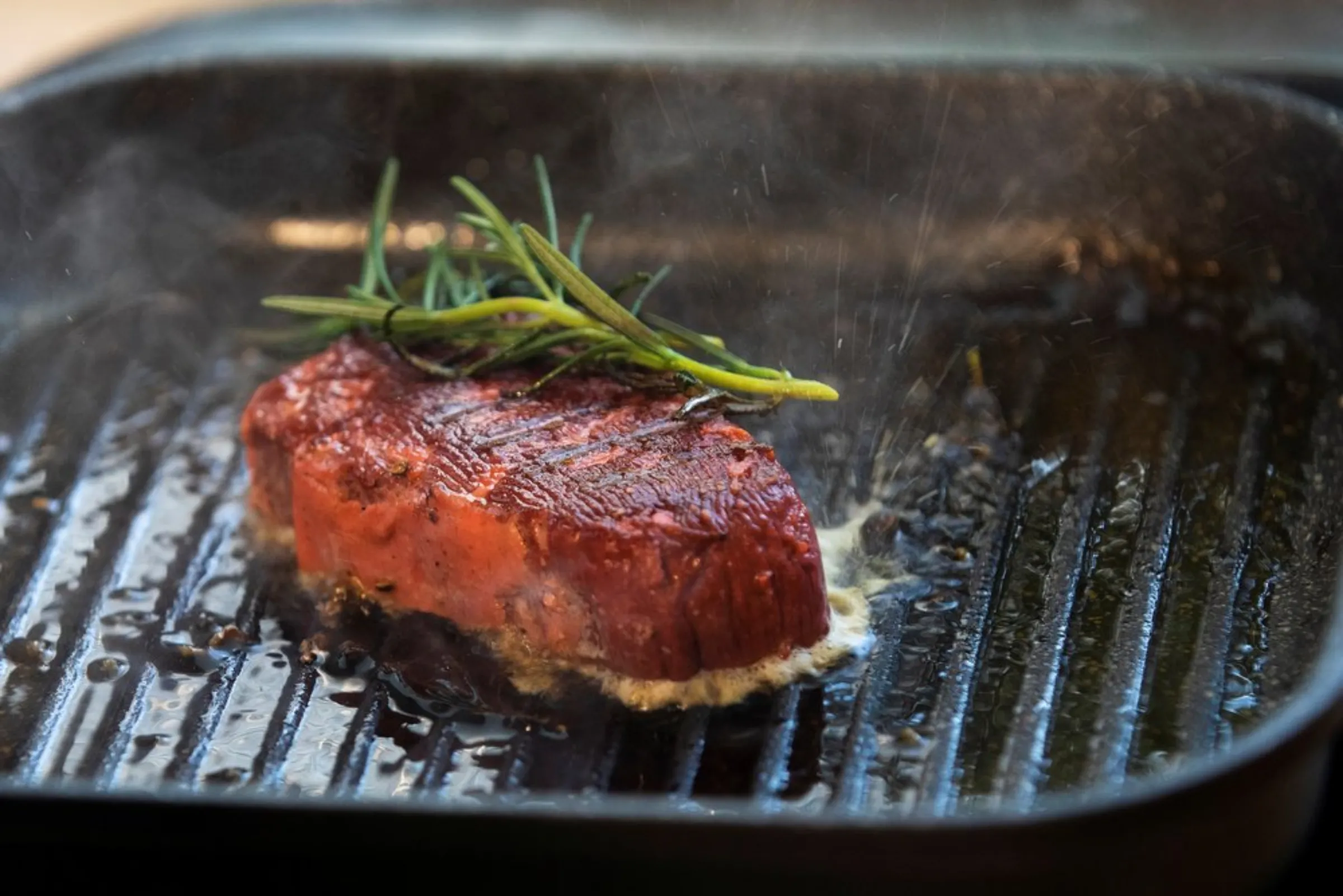 A 3D printed plant-based steak mimicking real beef and produced by Israeli start-up Redefine Meat is cooked during a demonstration for Reuters at their facility in Rehovot, Israel June 29, 2020