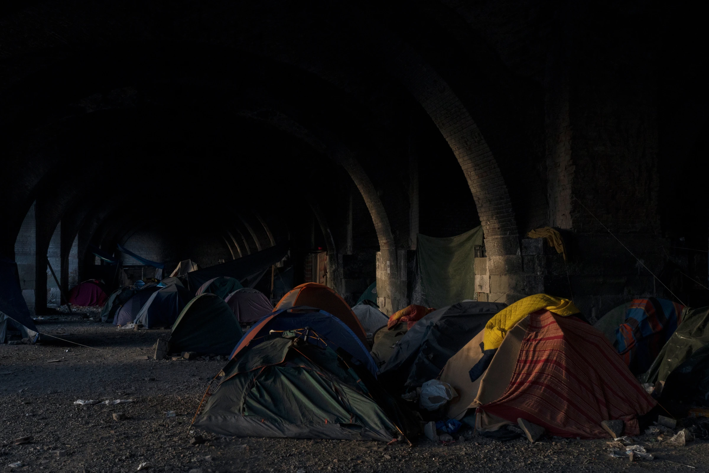 People on the move camp out in abandoned silos, in Trieste, Italy. March 5, 2024. Francesco Pistilli/International Rescue Committee/Handout via Thomson Reuters Foundation