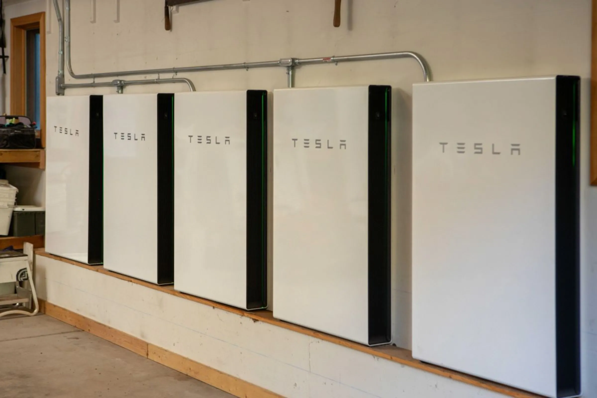 A battery system installed in a residential garage in Basalt, Colorado, in September 2023. Holy Cross Energy/Handout via Thomson Reuters Foundation