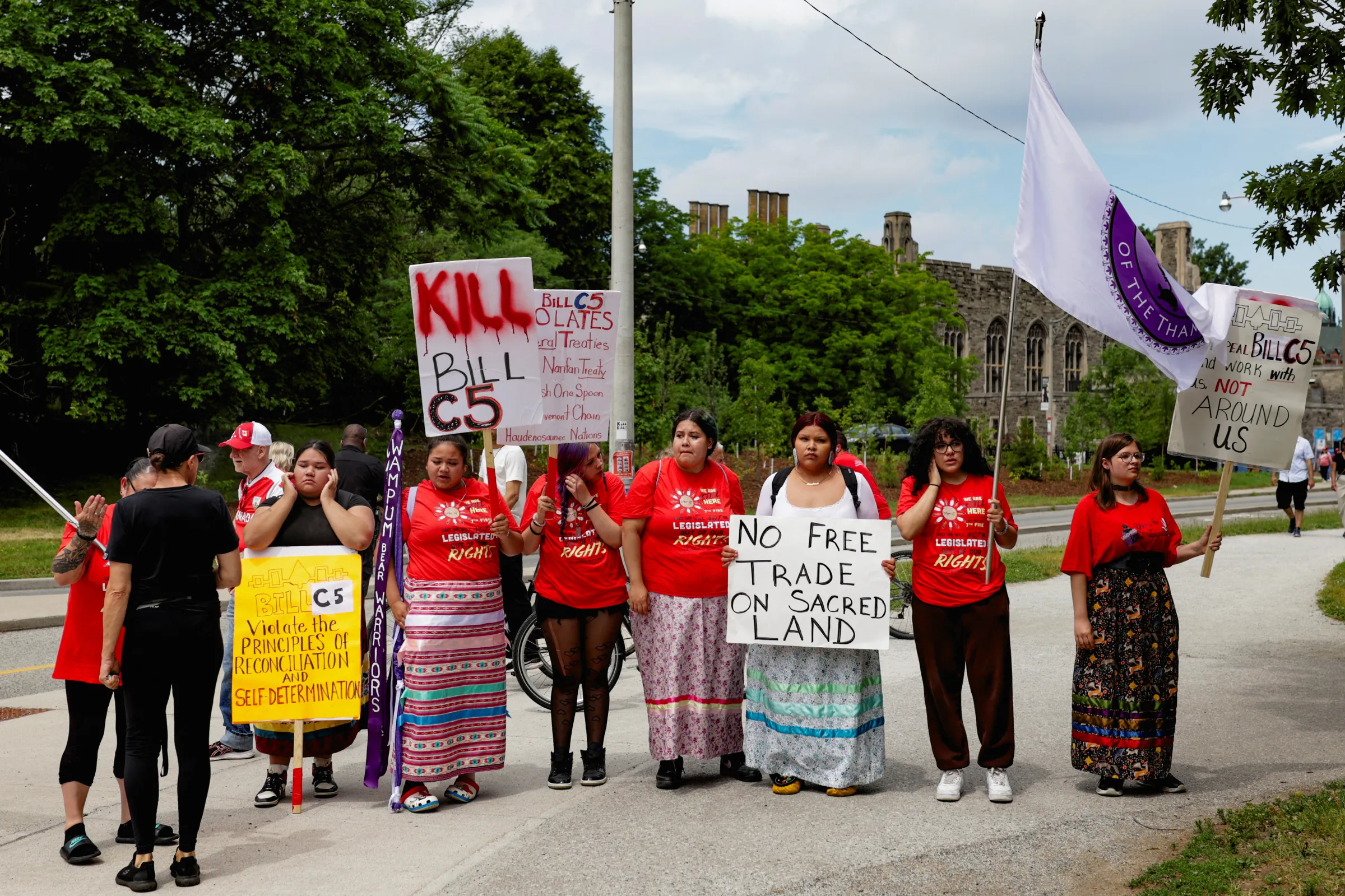 Demonstrators take part in a protest in front of the Legislative Assembly of Ontario against the federal government’s Bill C-5, on Canada Day, in Toronto, Ontario, Canada, July 1, 2025. REUTERS/Wa Lone