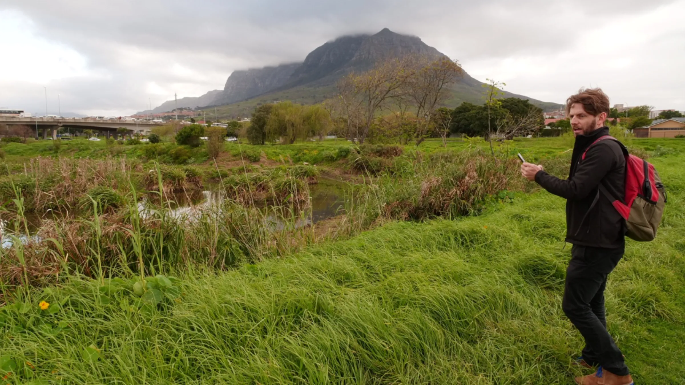 Nicholas Fordyce stands alongside the Liesbeek River in Cape Town, South Africa, September 6, 2023