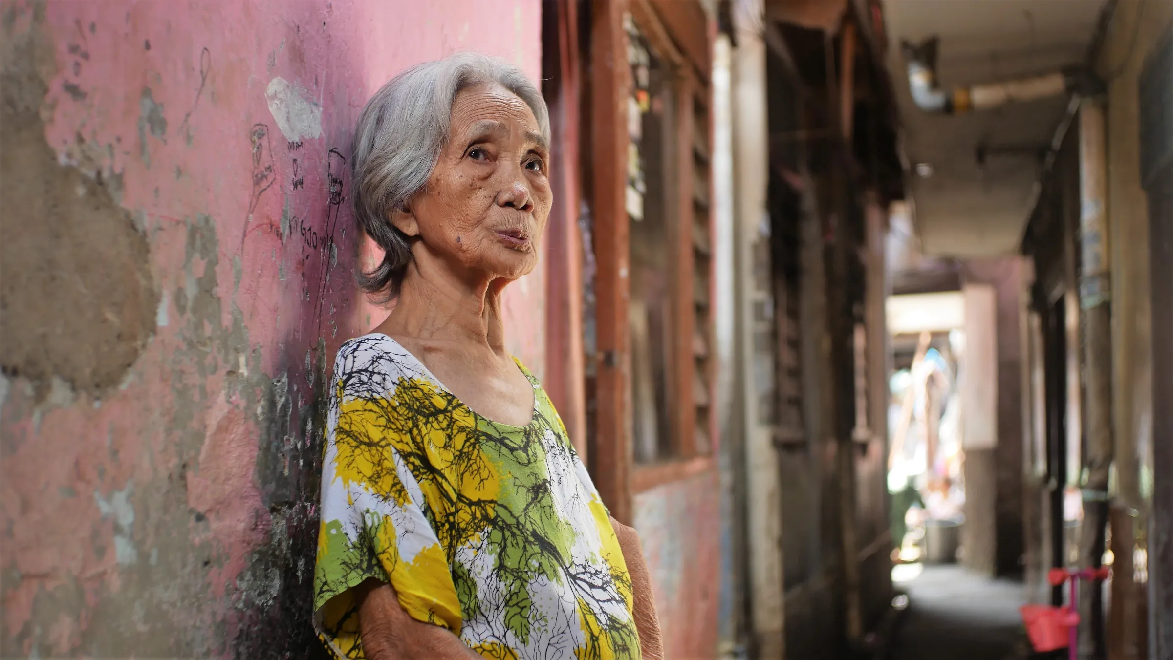 Napsiah, 77, in her home that she shares with nine others, in Pisangan Baru in Jakarta, Indonesia.