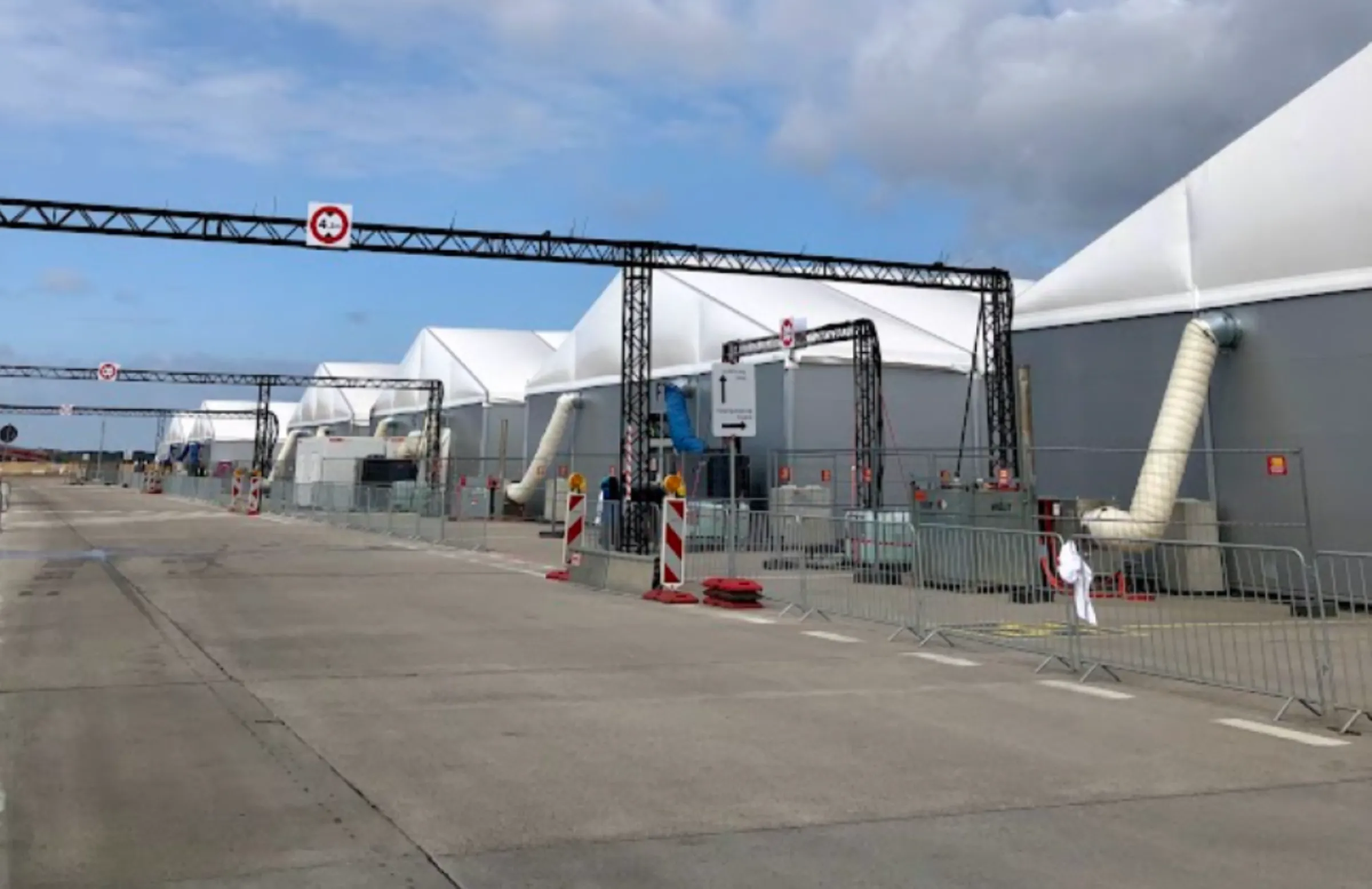 Authorities repurposed a former airport, Tegel, and built industrial marquees on site to accommodate thousands of Ukrainian refugees arriving daily last year in Berlin, Germany. April 25, 2023