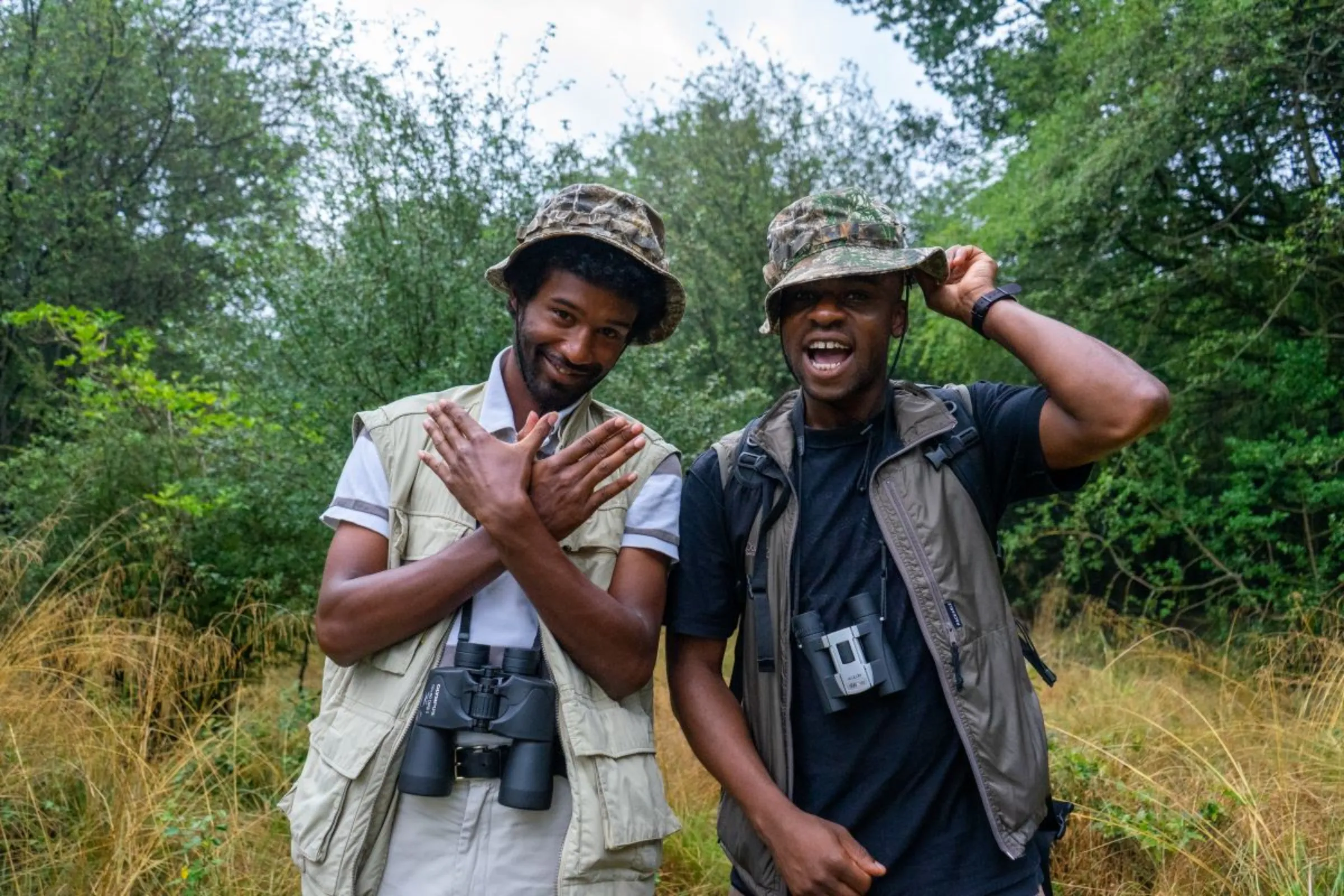 Ollie Olanipekun and Nadeem Perera, founders of Flock Together, a bird-watching group for people of colour in Britain, pose for a photo at Epping Forest in 2021. Flock Together/Dhamirah Coombes / Handout via Thomson Reuters Foundation