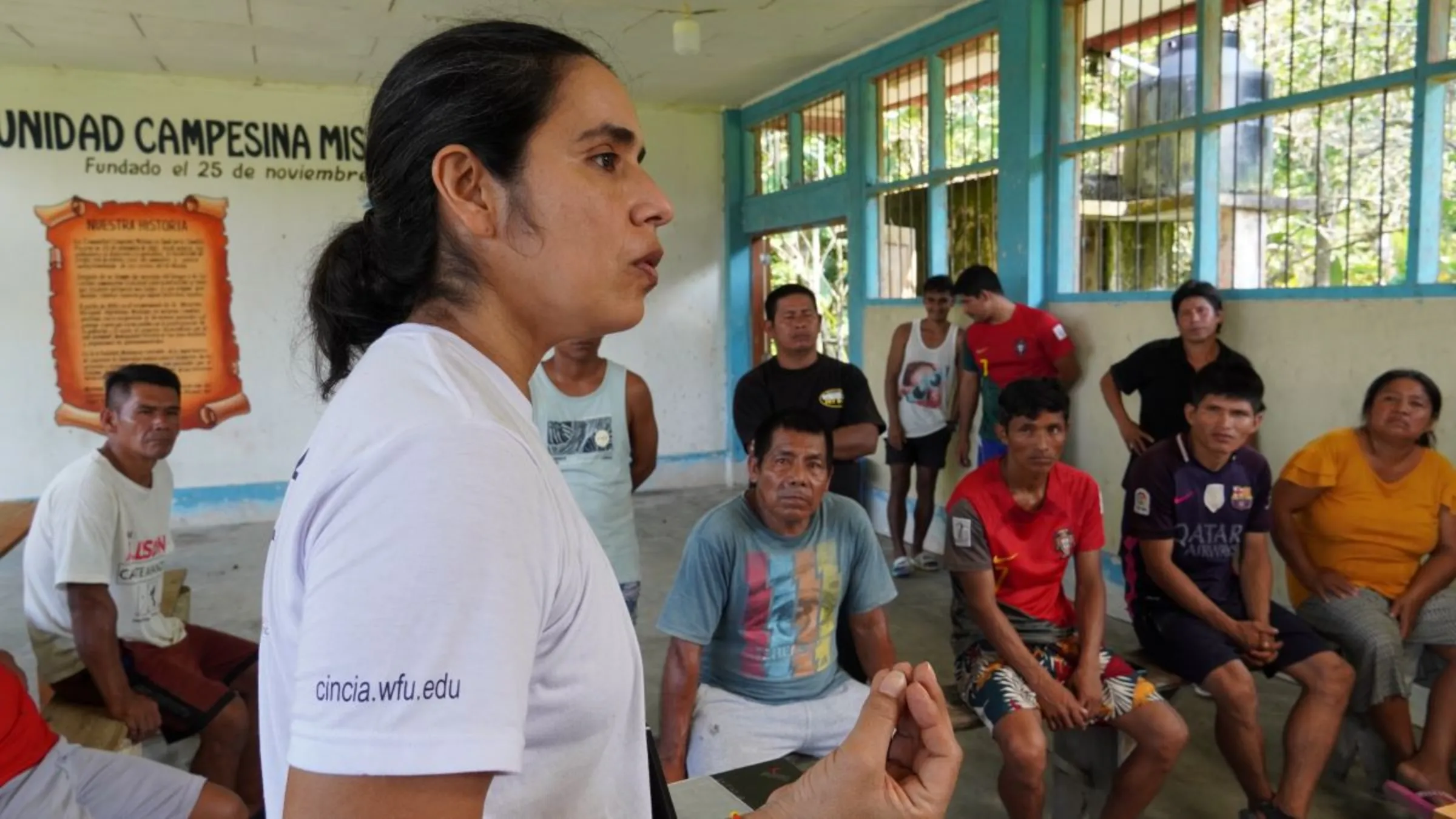 Claudia Vega, Mercury Coordinator for CINCIA, explains the dangers of illegal mining in the community hall in Mishana, on the Nanay RIver, Loreto, Peru, August 18, 2024. Thomson Reuters Foundation/Dan Collyns