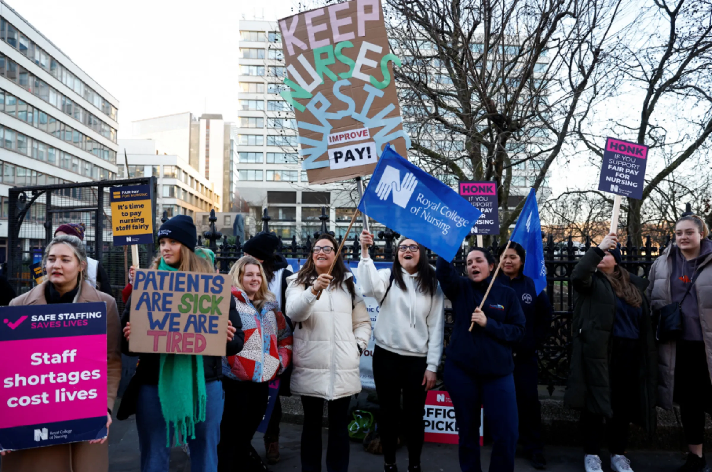 Nurses protest during a strike by NHS medical workers, amid a dispute with the government over pay, outside St Thomas' Hospital, in London, Britain, February 6, 2023