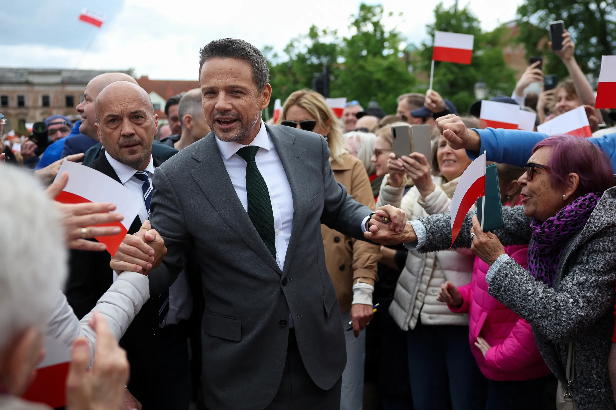 Civic Coalition presidential candidate, Warsaw Mayor Rafal Trzaskowski greets his supporters during an election rally in Plock, Poland, May 11, 2025. REUTERS/Kacper Pempel