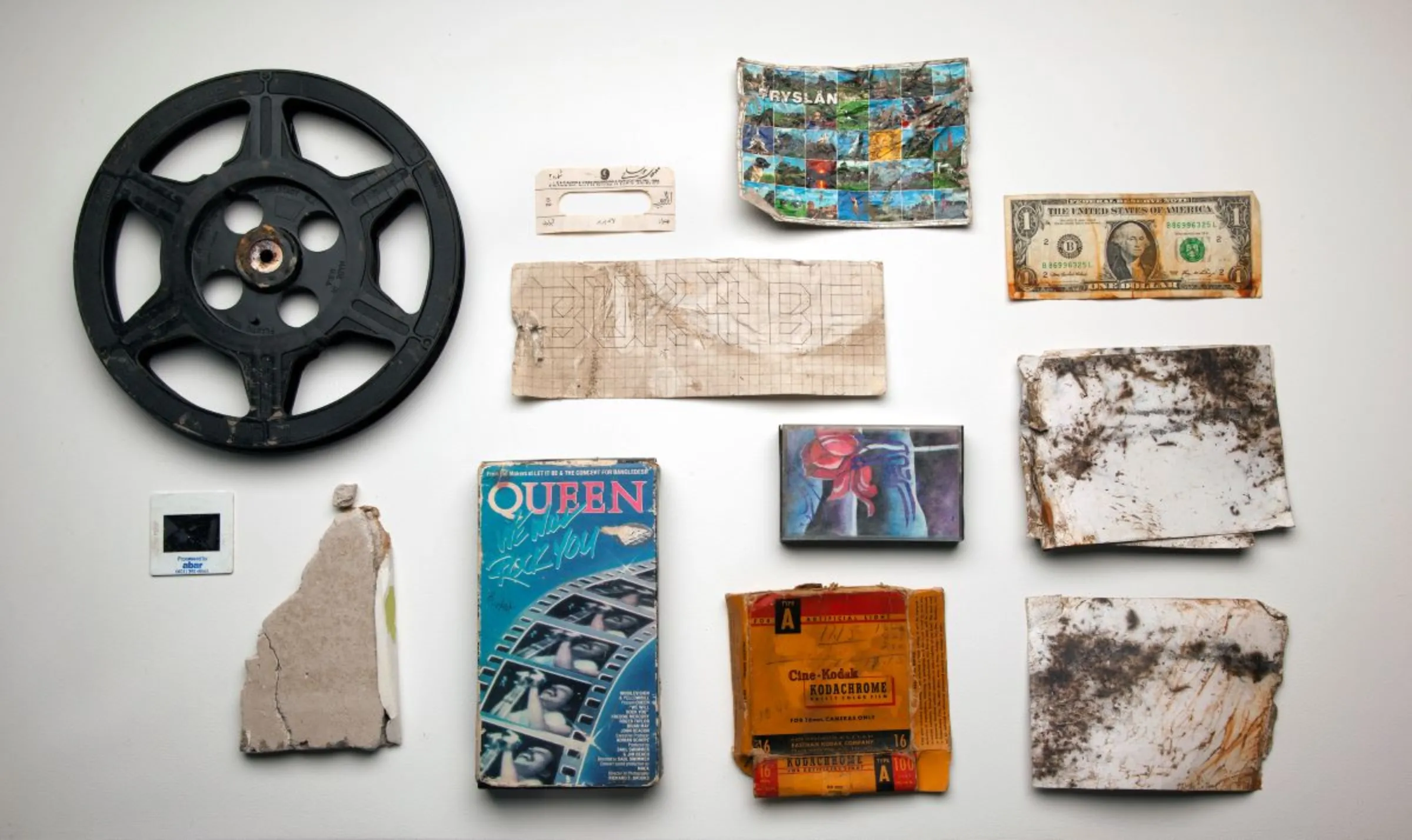 Objects contributed by people in places affected by climate change impacts that are a part of the New Orleans Collection in American artist Amy Balkin’s People's Archive of Sinking and Melting. Mary Lou Saxon Handout via Thomson Reuters Foundation