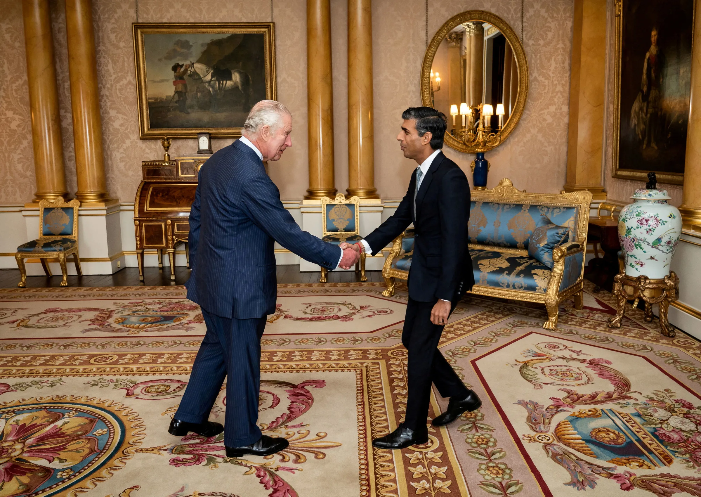 King Charles III welcomes Rishi Sunak during an audience at Buckingham Palace, London, where he invited the newly elected leader of the Conservative Party to become Prime Minister and form a new government. Tuesday October 25, 2022. Aaron Chown/PA Wire Aaron Chown/Pool via REUTERS