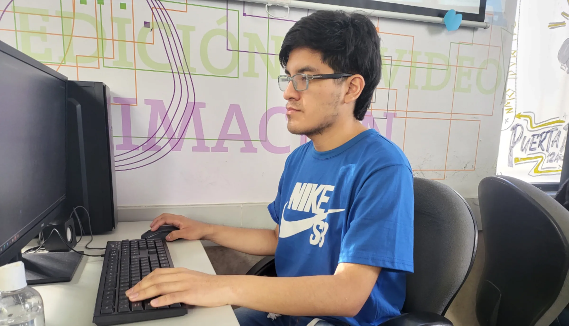 Tech student Oswaldo García studies at non-profit Puerta 18, in Buenos Aires, Argentina, on March 31, 2023. Thomson Reuters Foundation/David Feliba