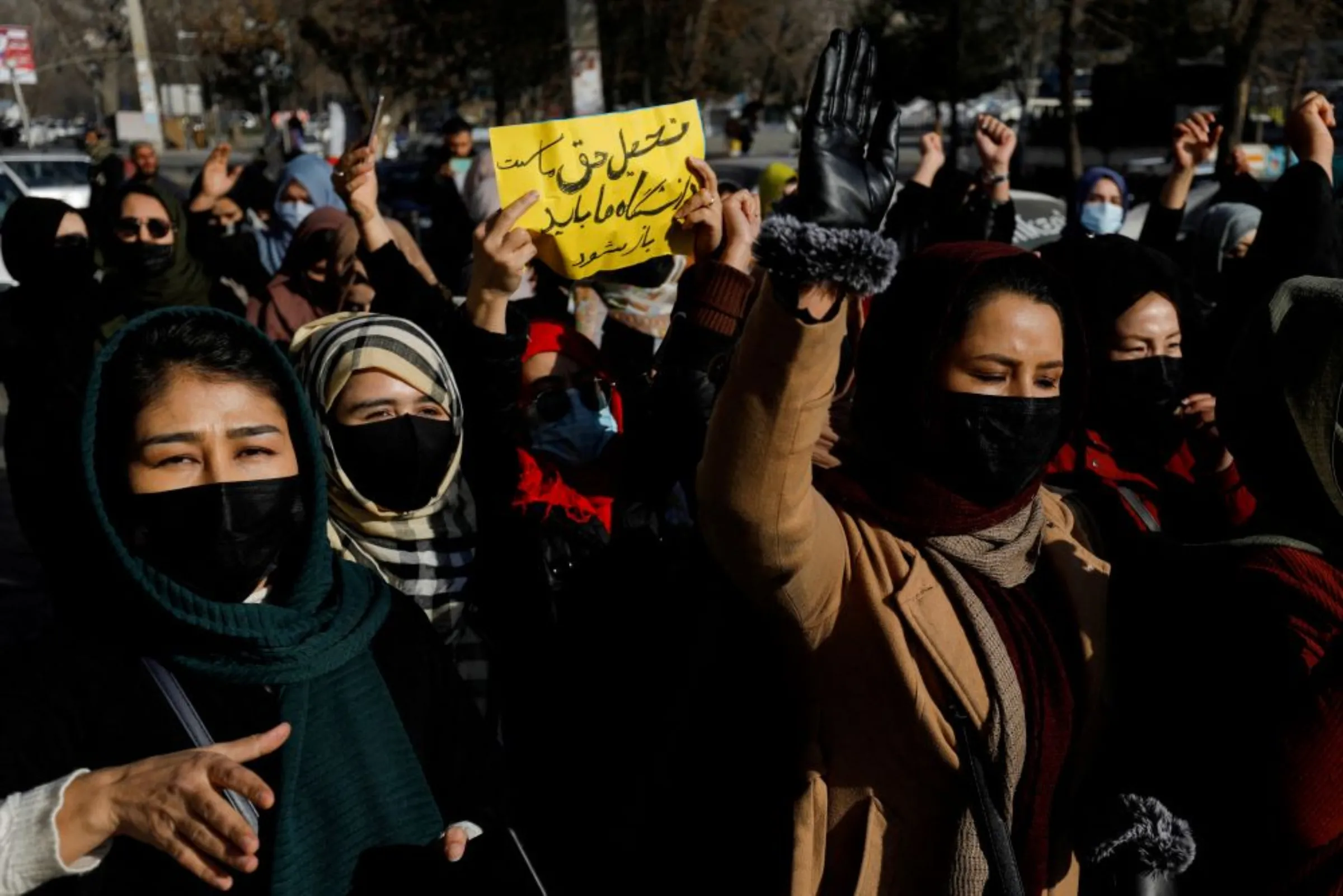 Afghan women chant slogans in protest against the closure of universities to women by the Taliban in Kabul, Afghanistan, December 22, 2022