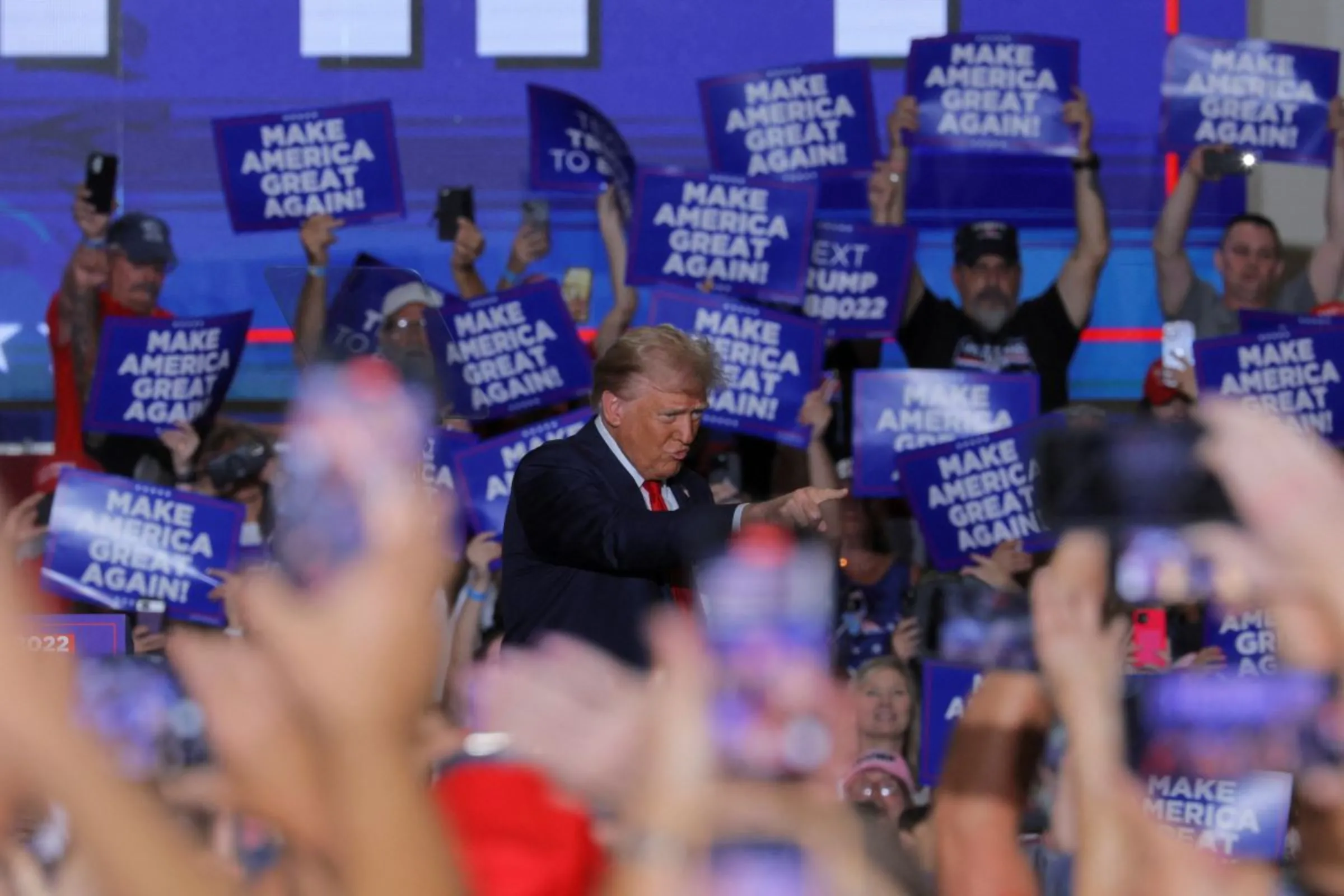 Republican presidential nominee former U.S. President Donald Trump gestures during a campaign rally in Erie, Pennsylvania, U.S., September 29, 2024. REUTERS/Brian Snyder