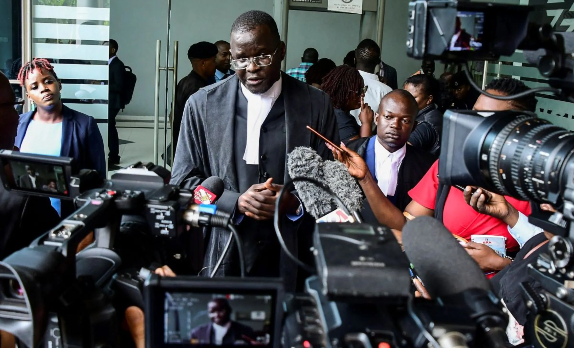 Uganda Human Rights lawyer Nicholas Opiyo speaks to the press after the Constitutional Court upheld the anti-LGBTQ Law in Kampala, Uganda April 3, 2024. REUTERS/Abubaker Lubowa