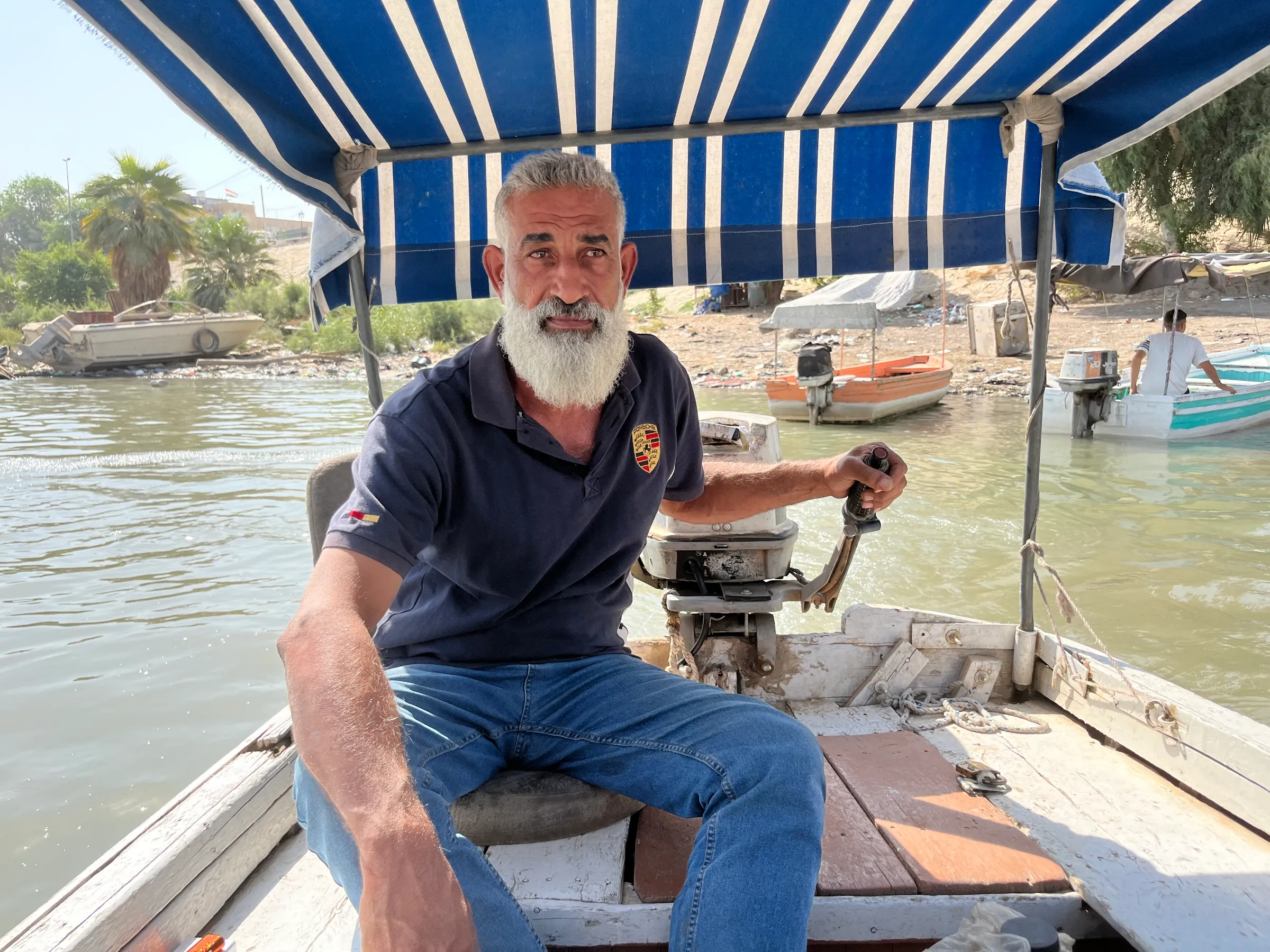 Ahmad Hassan Lelo, 56, ferries people across the Tigris River in Baghdad. October 14, 2022