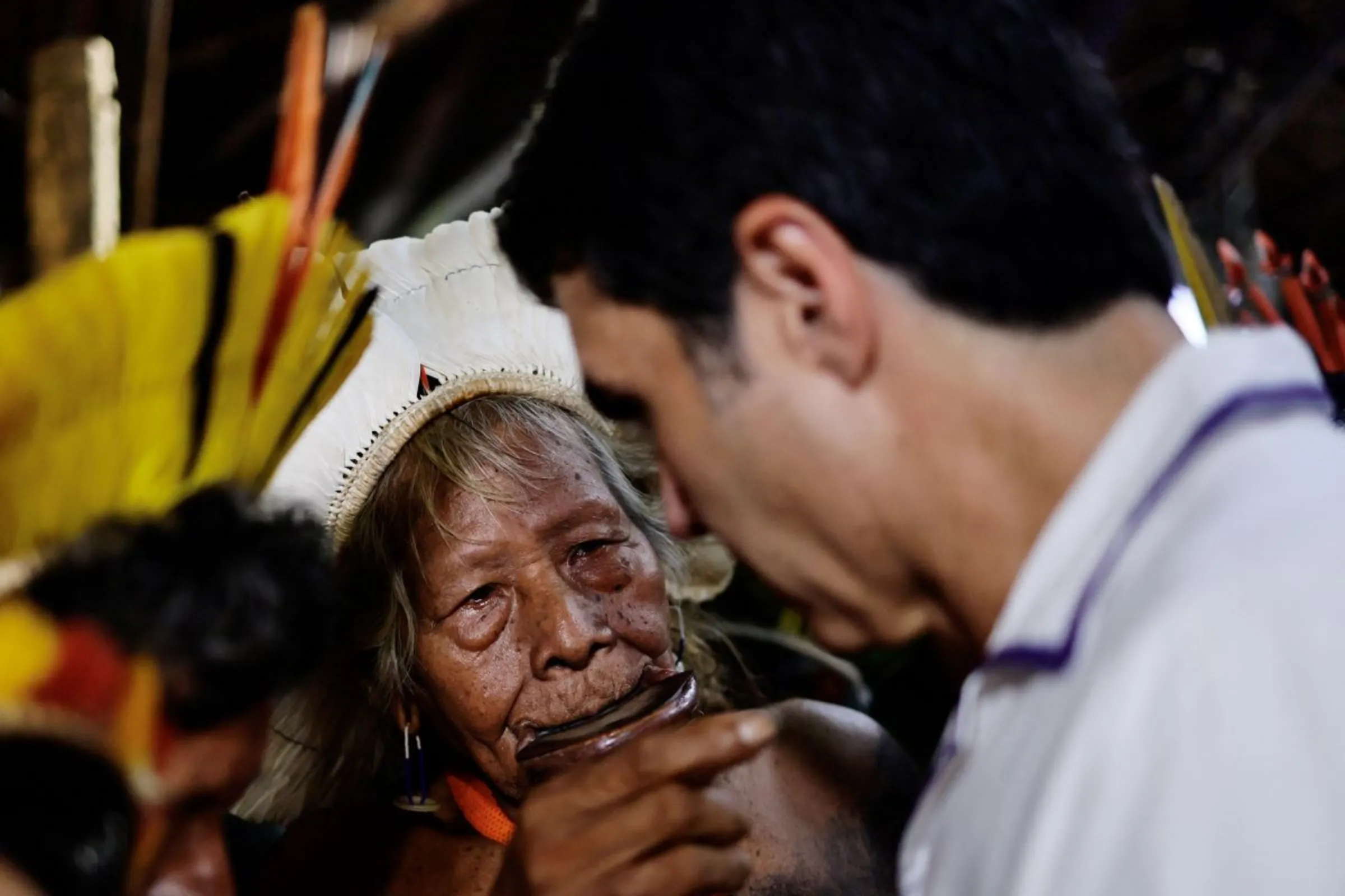 Brazil's indigenous chief Raoni Metuktire speaks with Governor of Brazil's Para state Helder Barbalho during a Dialogos da Amazonia (Amazon Dialogues) event before a summit of Amazon rainforest nations at the Igarape Park, in Belem, Para state, Brazil August 4, 2023