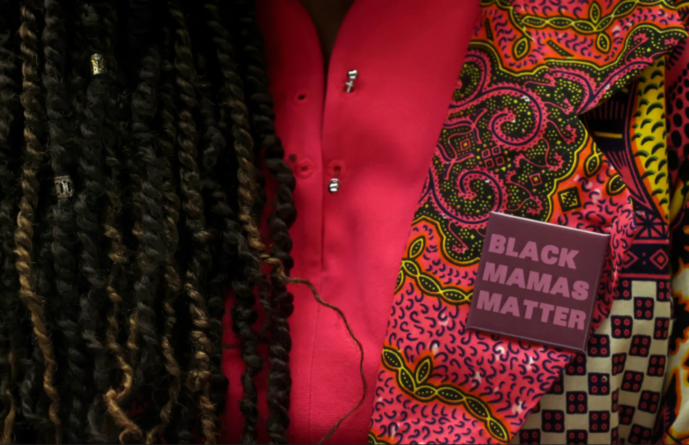 A woman wears a pin in support of Black mothers during a hearing titled, 'Birthing While Black: Examining America's Black Maternal Health Crisis' on Capitol Hill in Washington, U.S., May 6, 2021