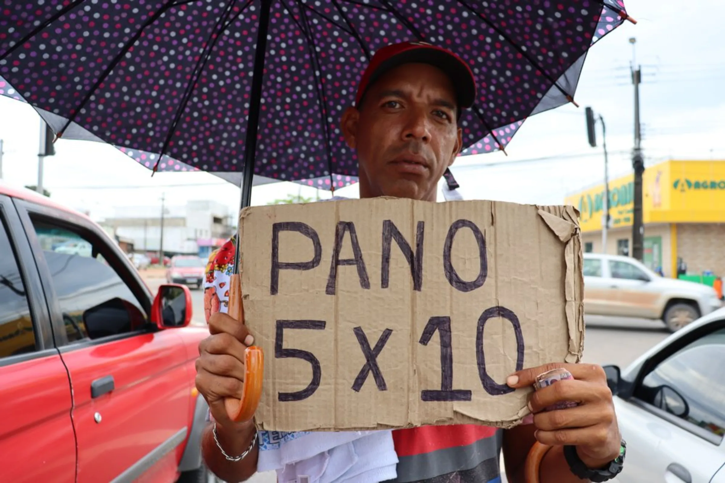 Jarri Marcano, 40, a Venezuelan migrant in Brazil, sells towels on Venezuela Avenue, a street in Boa Vista, Roraima April 16, 2021