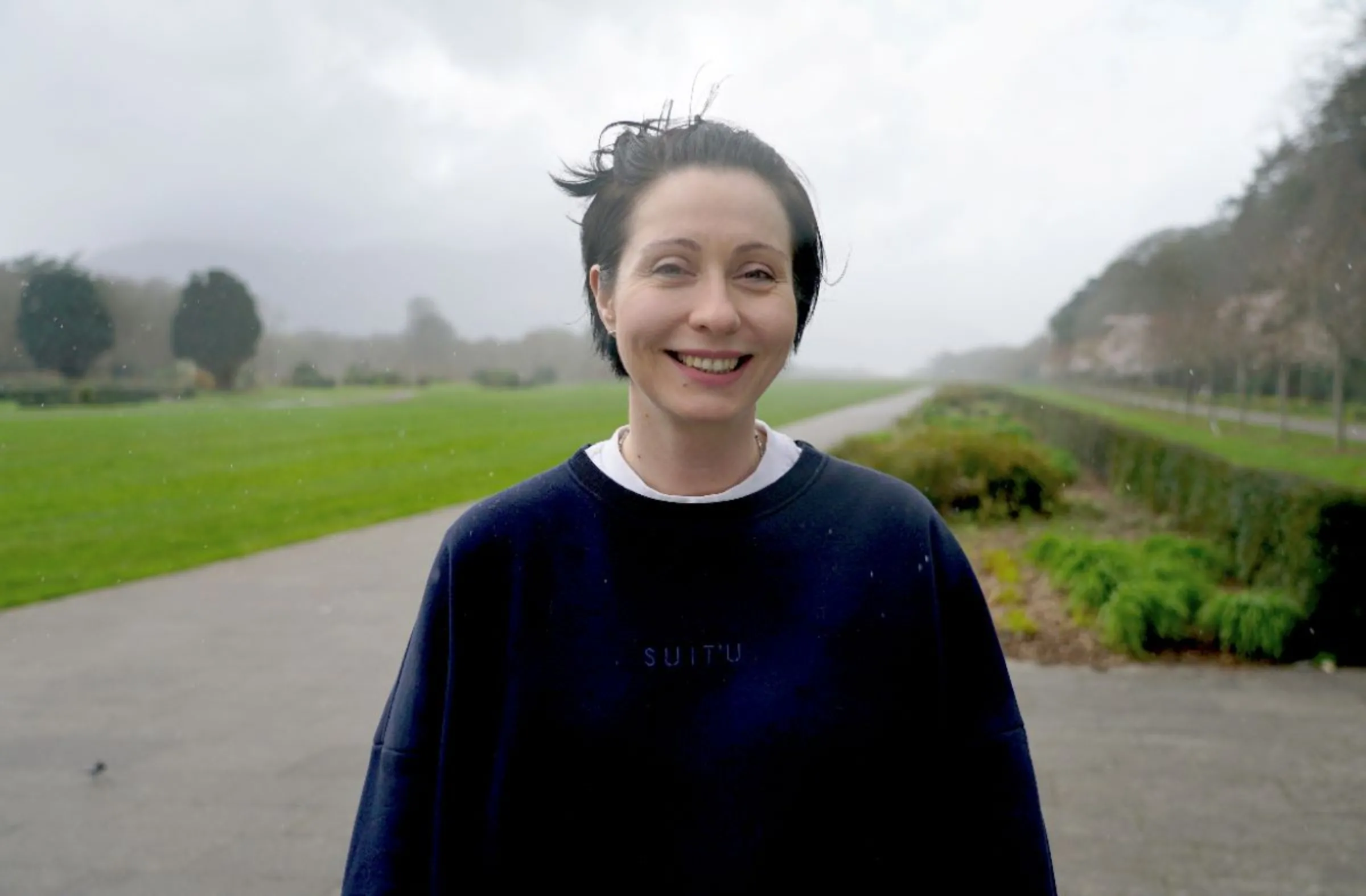 Natalya Krasnenkova sits in a park in the town of Killarney, Ireland, March 2023