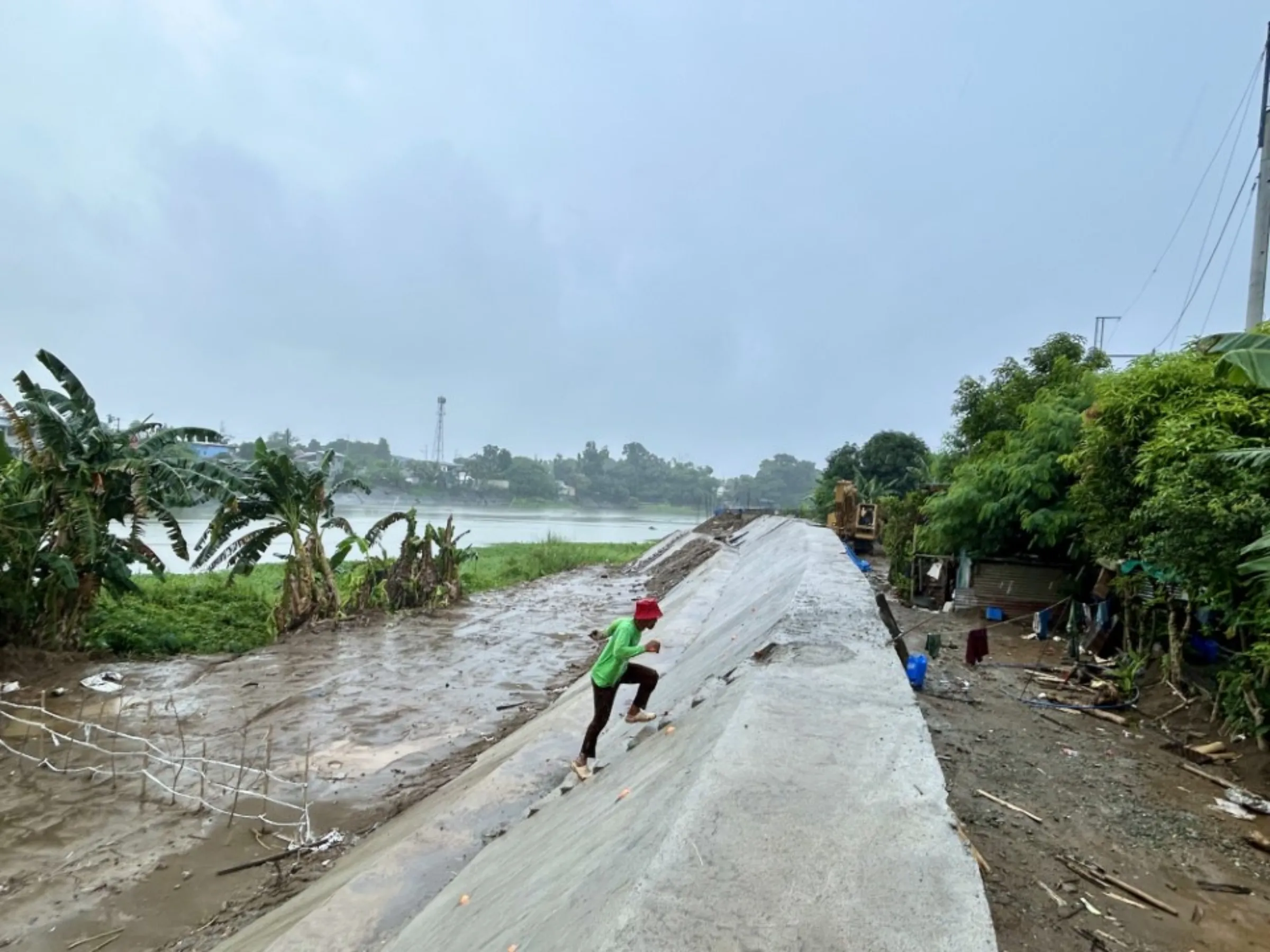 Recent inspections revealed this flood control project in Barangay Sipat, Plaridel, Bulacan was supposed to be completed in 2024 but construction began only in August 2025. Sept. 16, 2025. Mariejo Ramos/Thomson Reuters Foundation