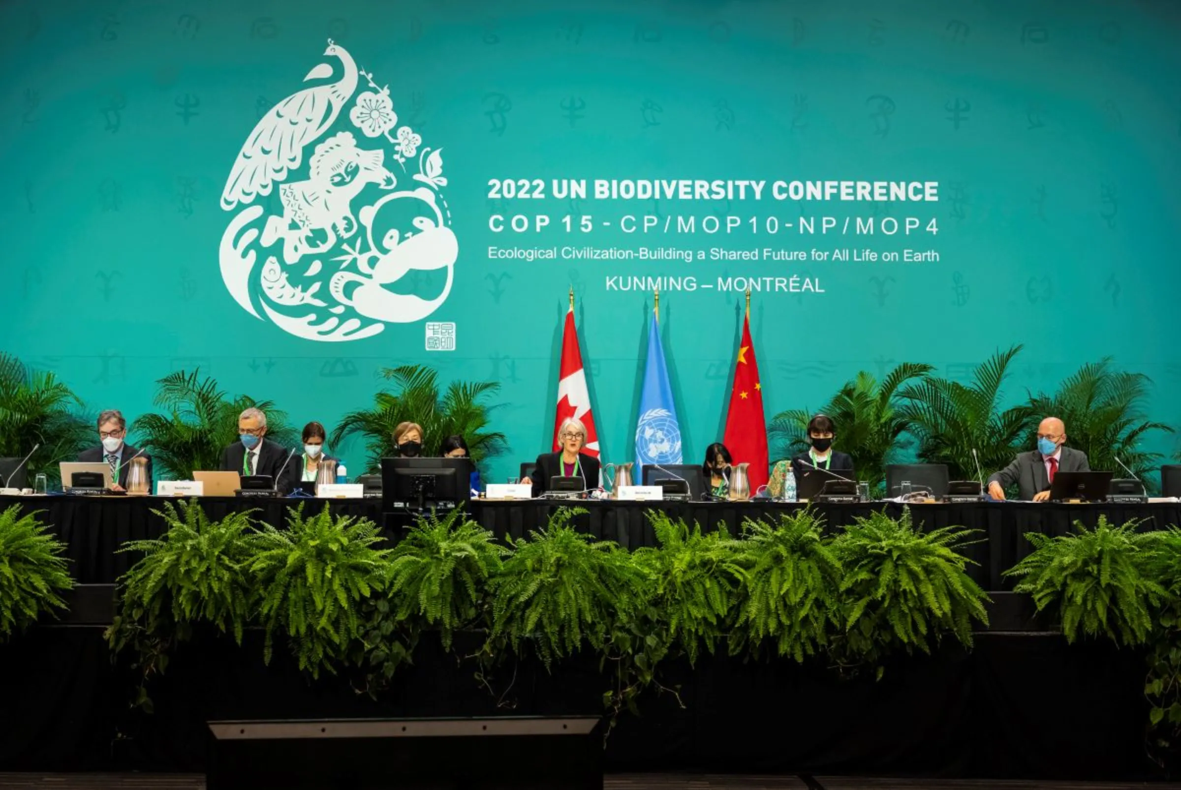 Officials speak during a panel at the COP15 summit on biodiversity in Montreal, Canada, 7 December 2022. UN Biodiversity/Handout via Thomson Reuters Foundation