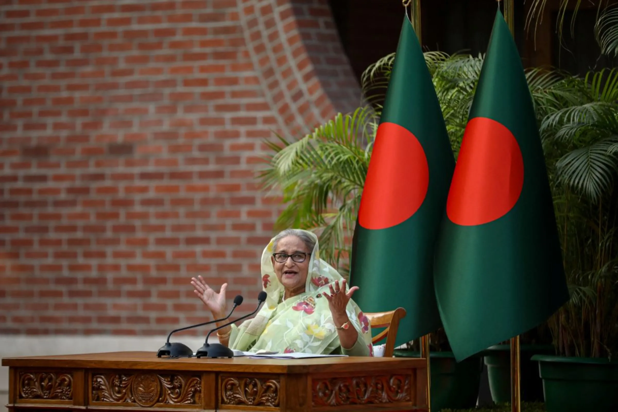 Sheikh Hasina, the newly elected Prime Minister of Bangladesh and Chairperson of Bangladesh Awami League, gestures during a meeting with foreign observers and journalists at the Prime Minister's residence in Dhaka, Bangladesh, January 8, 2024. REUTERS/Mohammad Ponir Hossain
