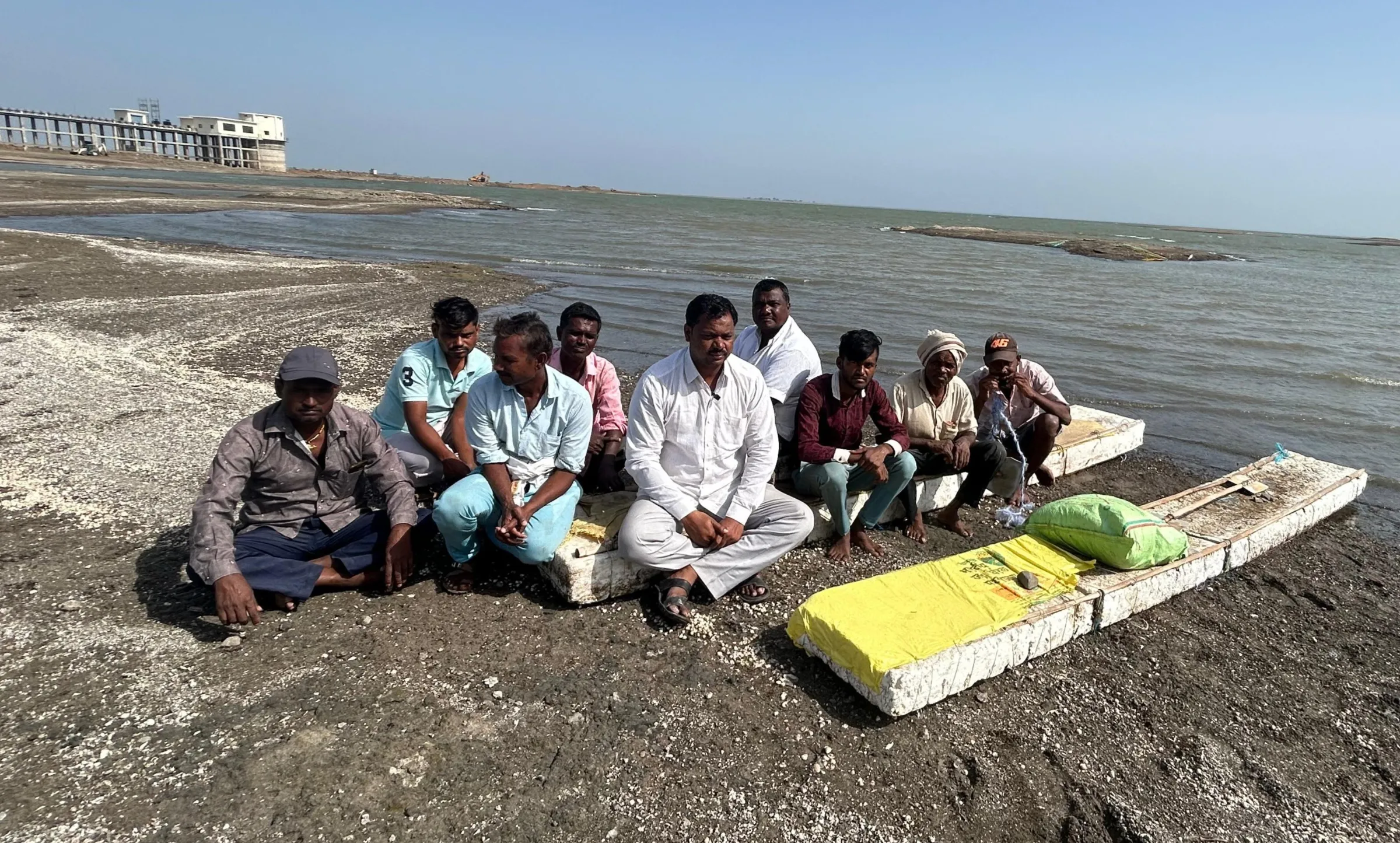 Bajrang Limbore, president of the Save Jayakwadi Fishermen committee (C) with other fishermen is leading protests against a floating solar plant near Jayakwadi Dam in Maharashtra state, India, in June 2024. Yash Sadhak Shrivastava/Thomson Reuters Foundation