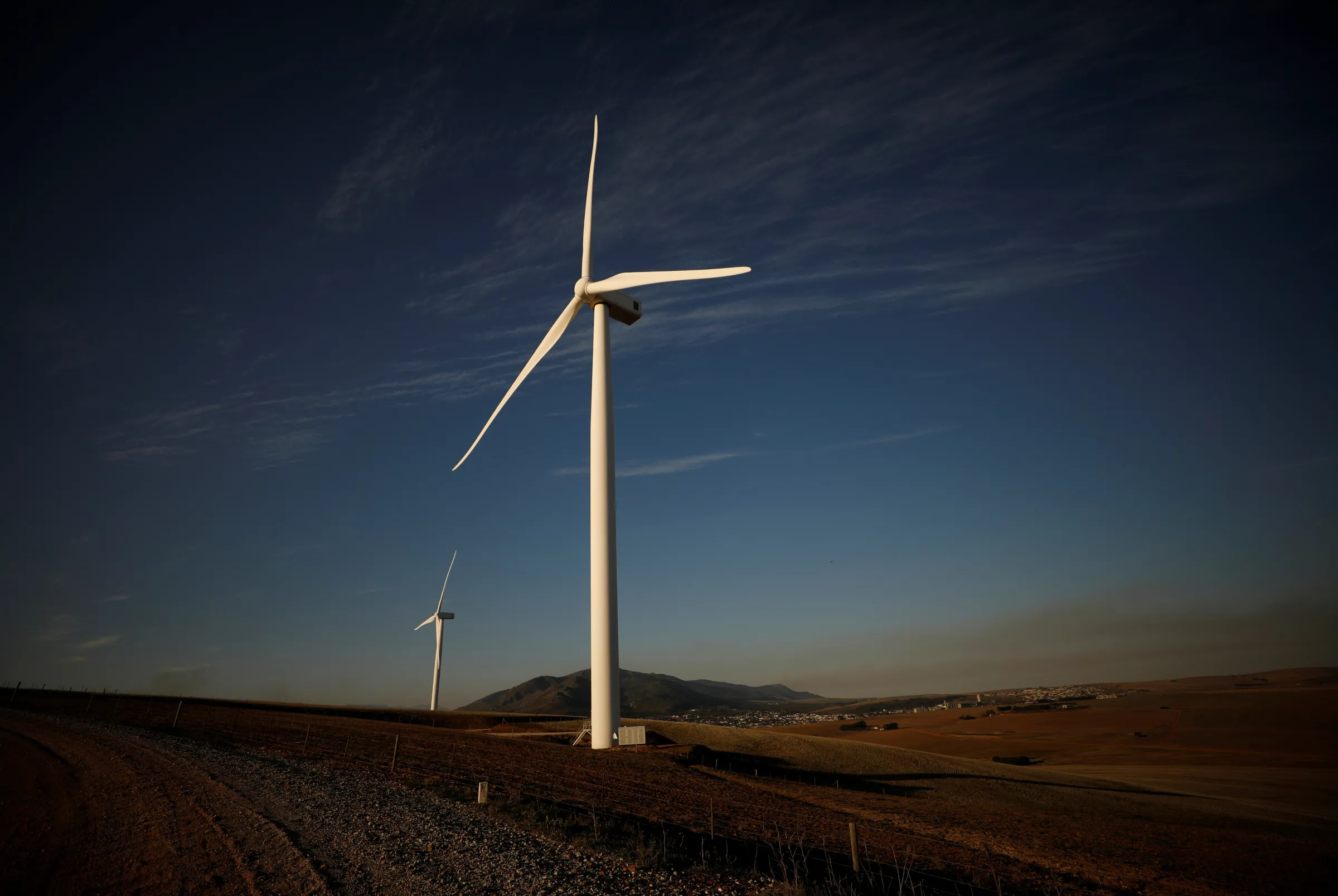 Wind turbines produce renewable energy outside Caledon, South Africa, May 20, 2020. Picture taken May 20, 2020. REUTERS/Mike Hutchings