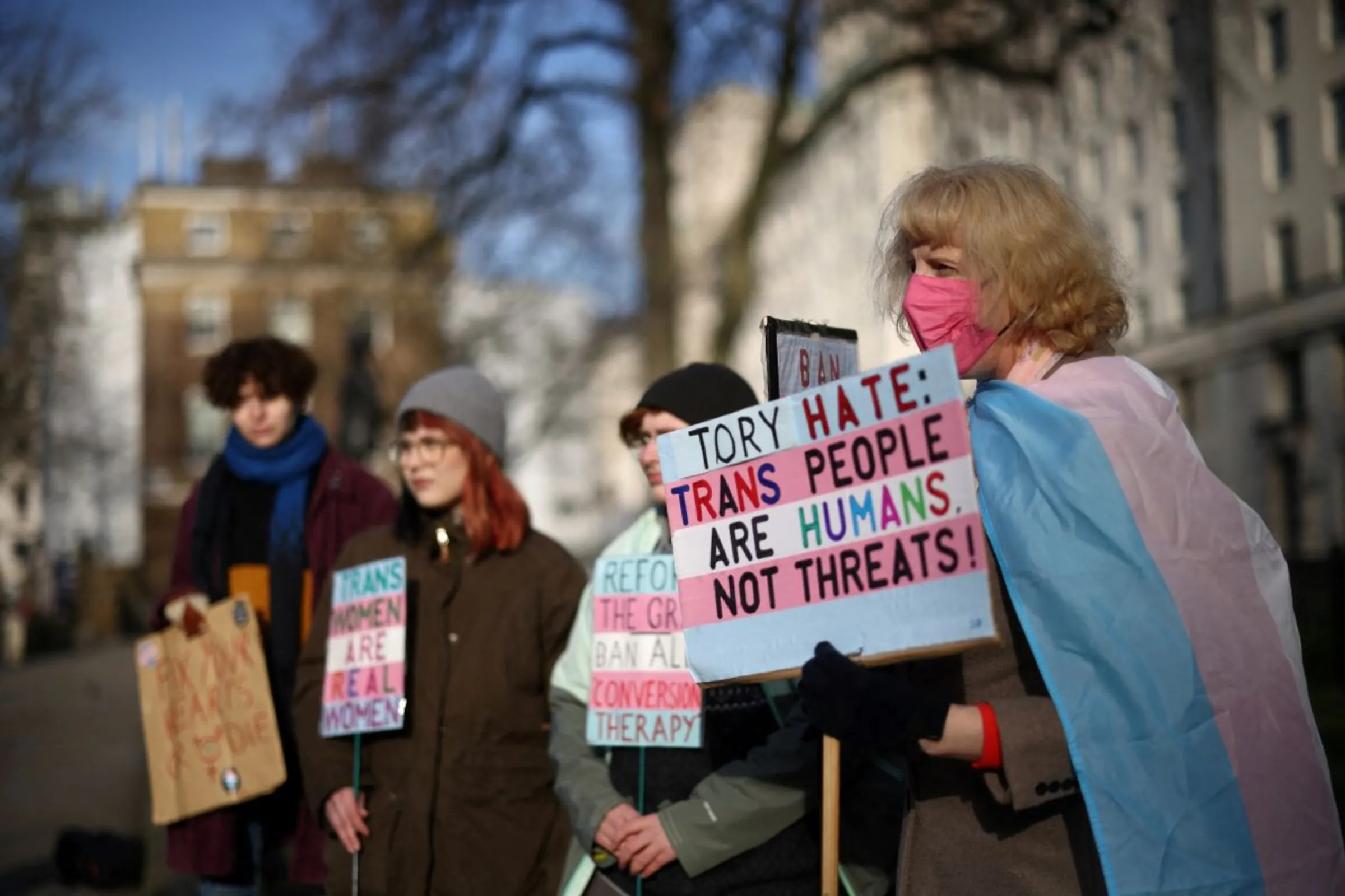 Transgender rights supporters protest in favour of Scottish gender reform bill outside Downing Street in London, Britain January 17, 2023. REUTERS/Henry Nicholls