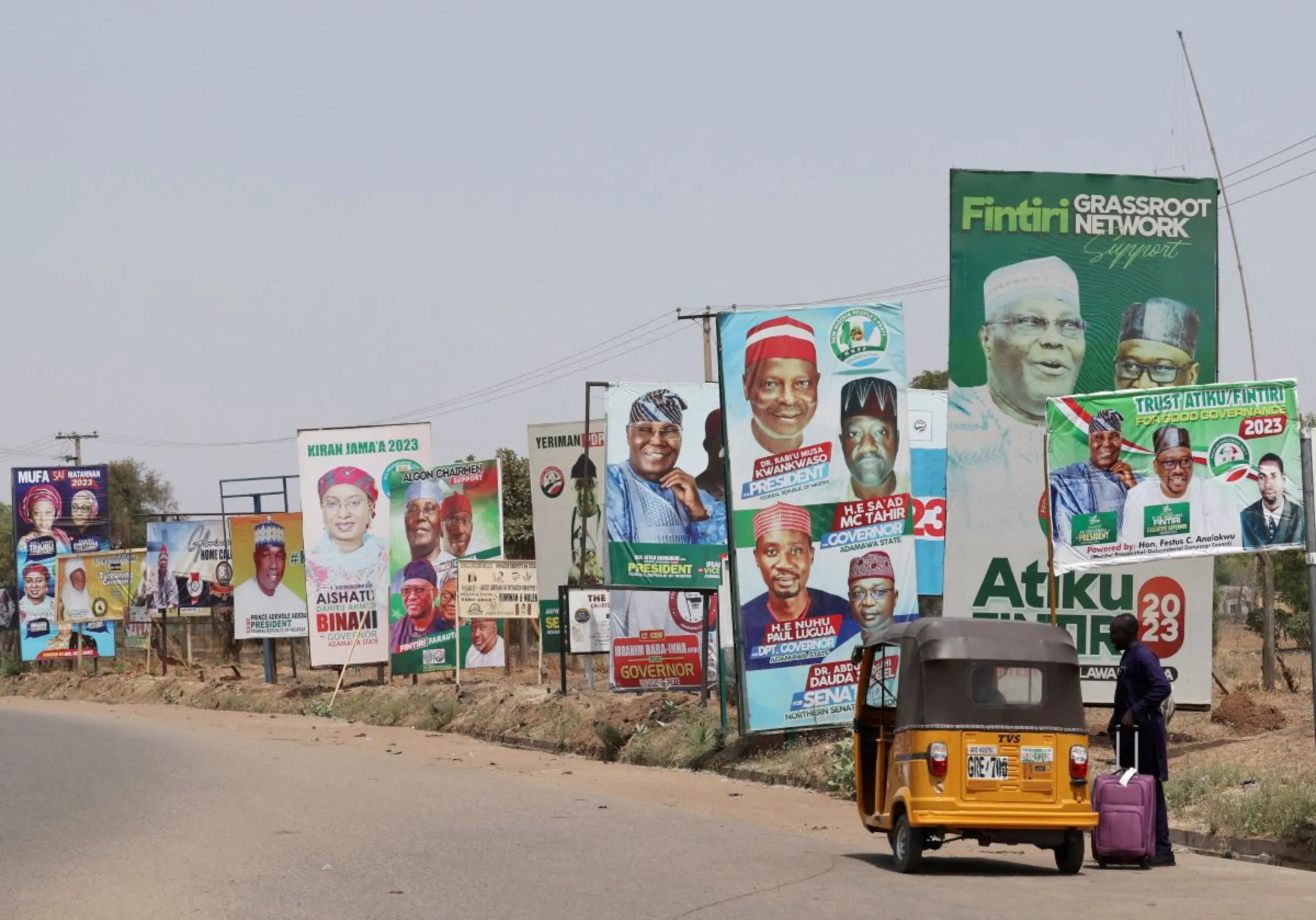 Electoral campaign posters are seen in Numan road, ahead of Nigeria's Presidential elections, in Yola, Nigeria, February 23, 2023 TPX IMAGES OF THE DAY