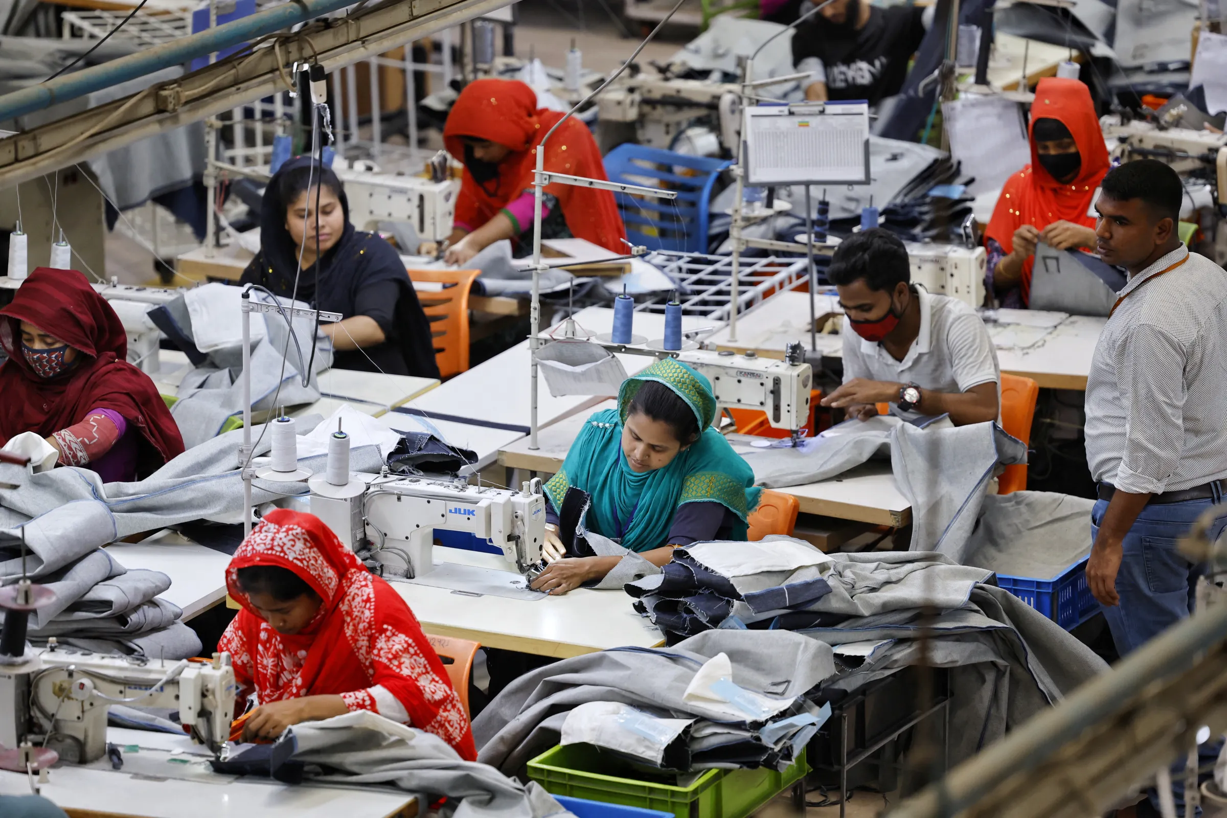 Bangladeshi garment workers works in the sewing section of a factory in Gazipur, Bangladesh, April 9, 2025. REUTERS/Mohammad Ponir Hossain